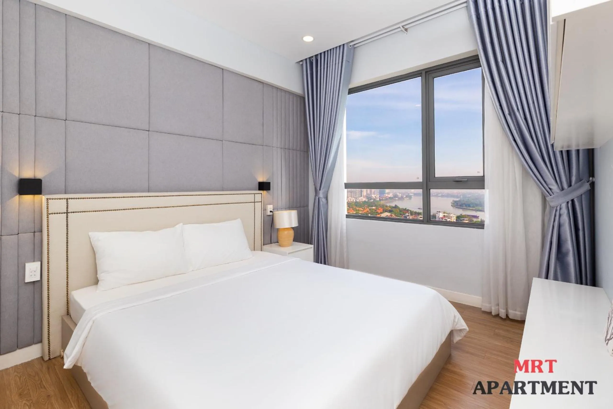 Bed in MRT Apartment In Masteri Thao Dien