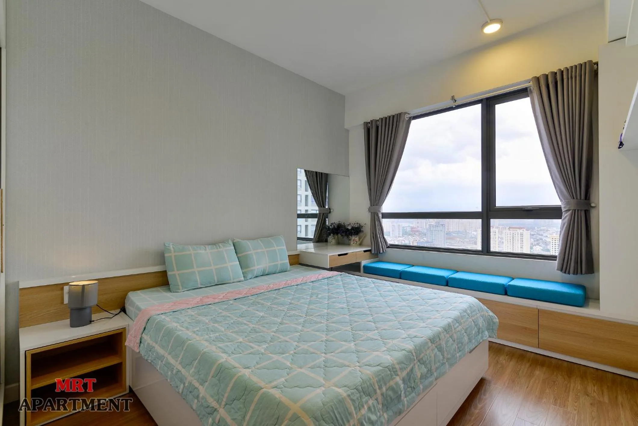 Bed in MRT Apartment In Masteri Thao Dien