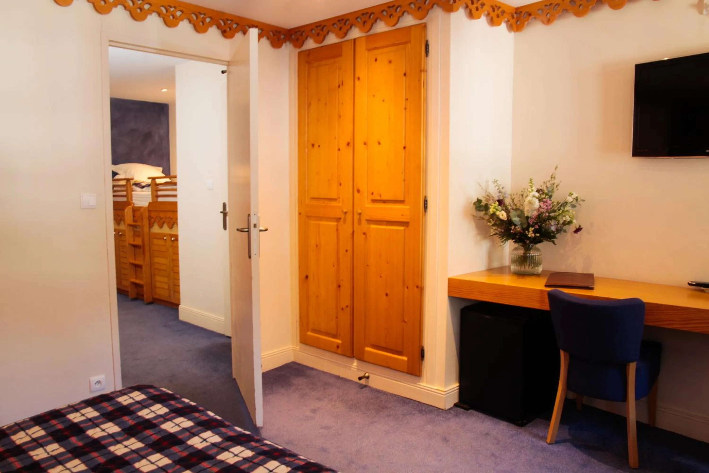 Photo of the whole room, Bed in Hôtel Le Bois Joli