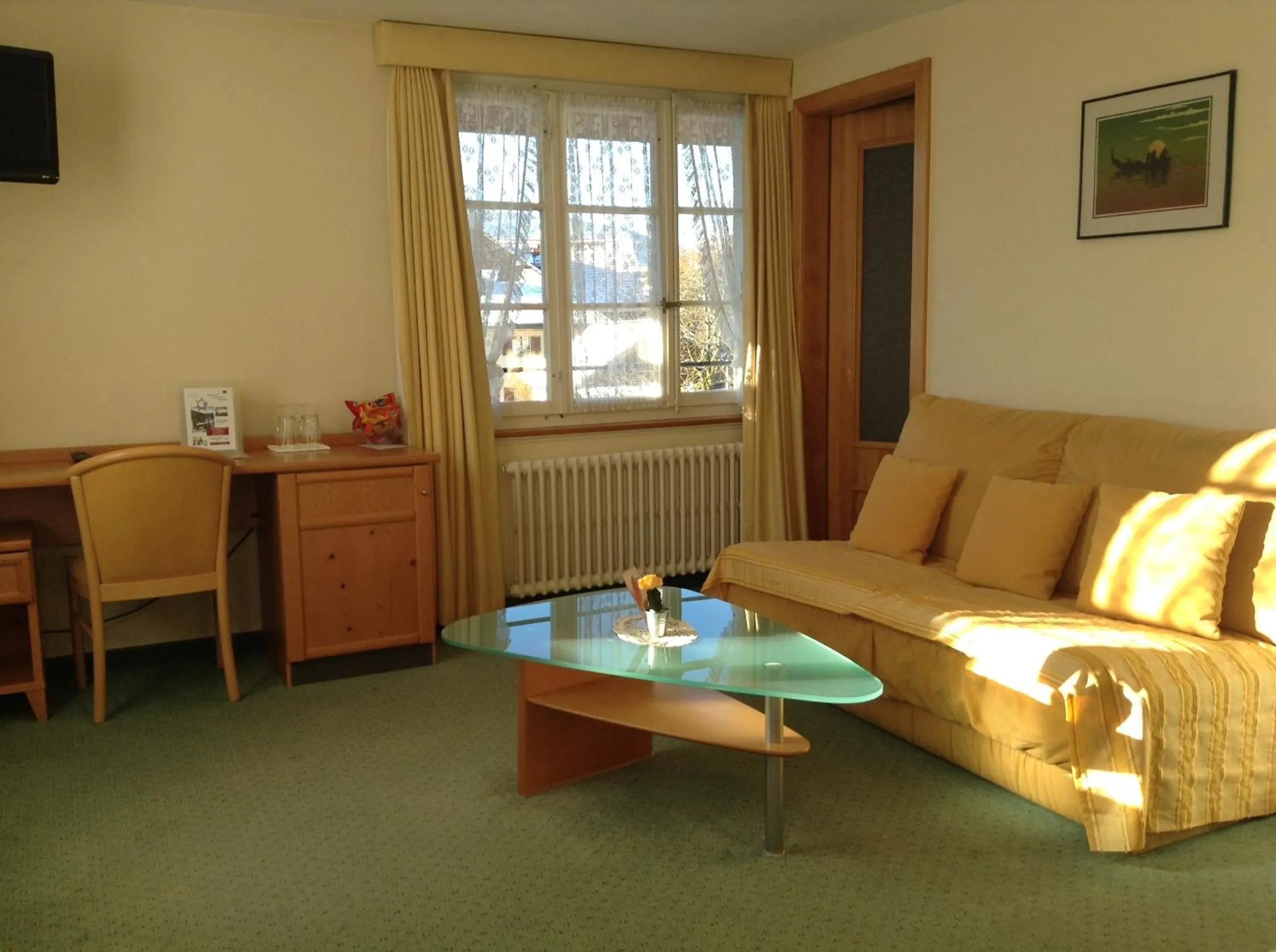 Living room in Hôtel Restaurant le Gruyérien