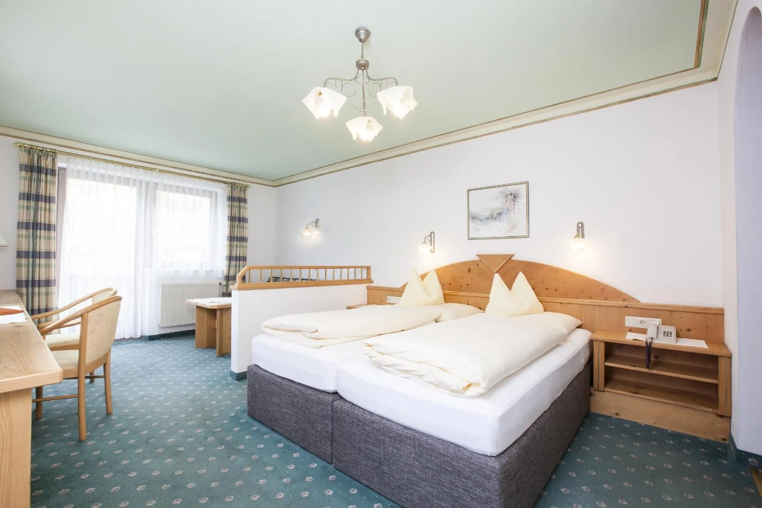 Bedroom, Bed in Hotel & Appartements Alpenresidenz Viktoria