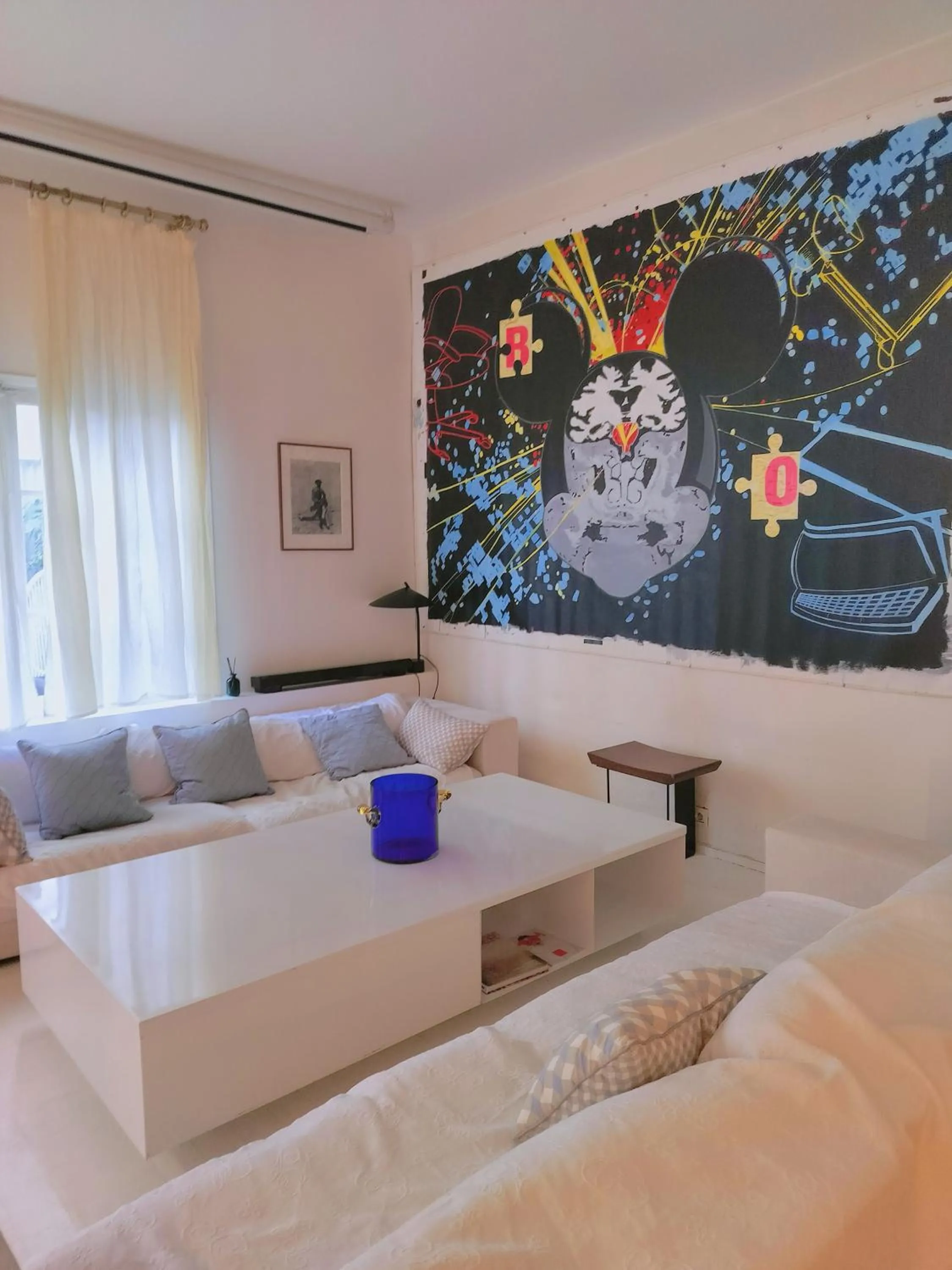 Living room, Bed in Maison Nomade Paris - MaisonNomadeChic