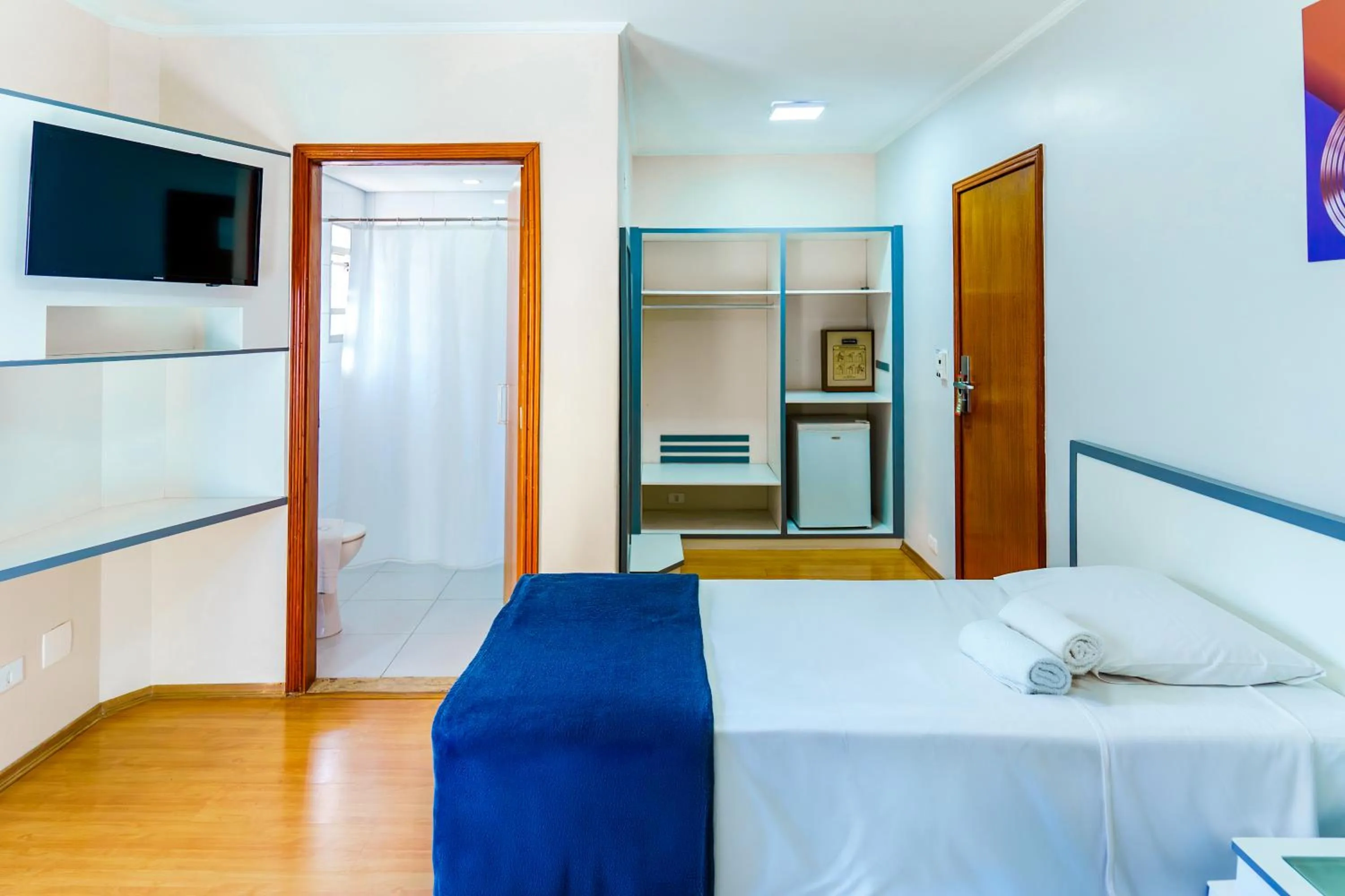 Bed in Carillon Plaza Hotel