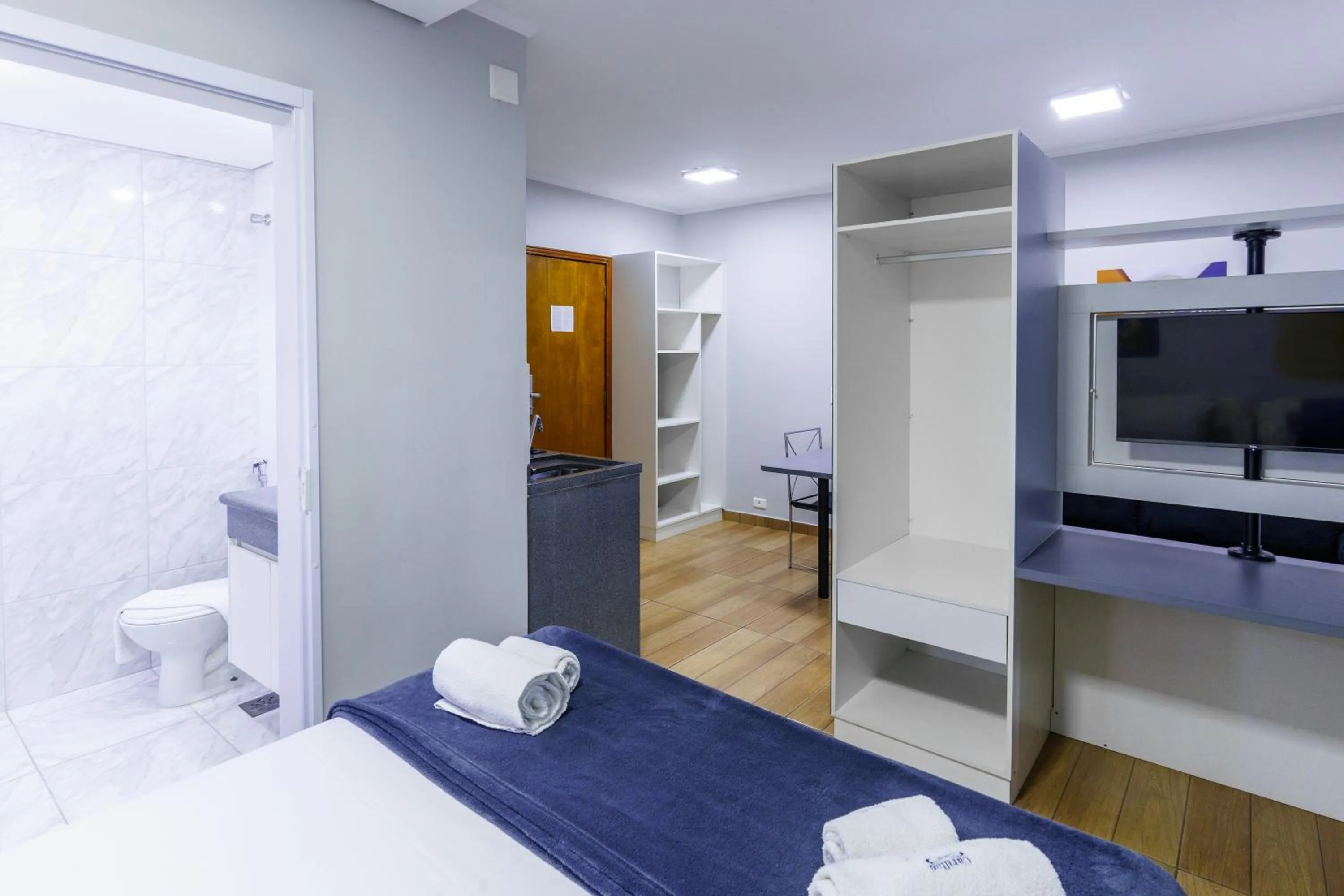 Bed in Carillon Plaza Hotel