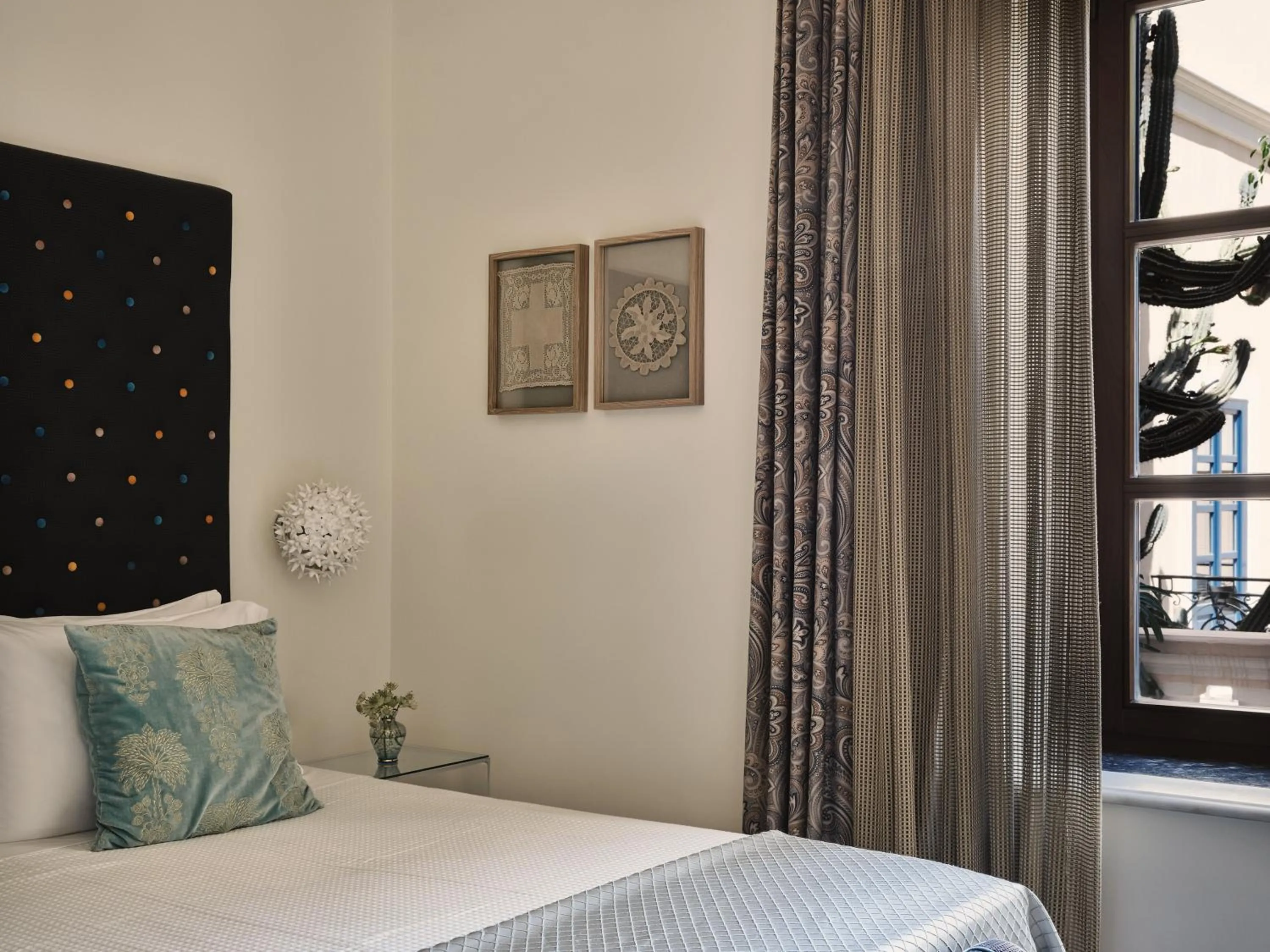 Bed in Casa Delfino Hotel & Spa