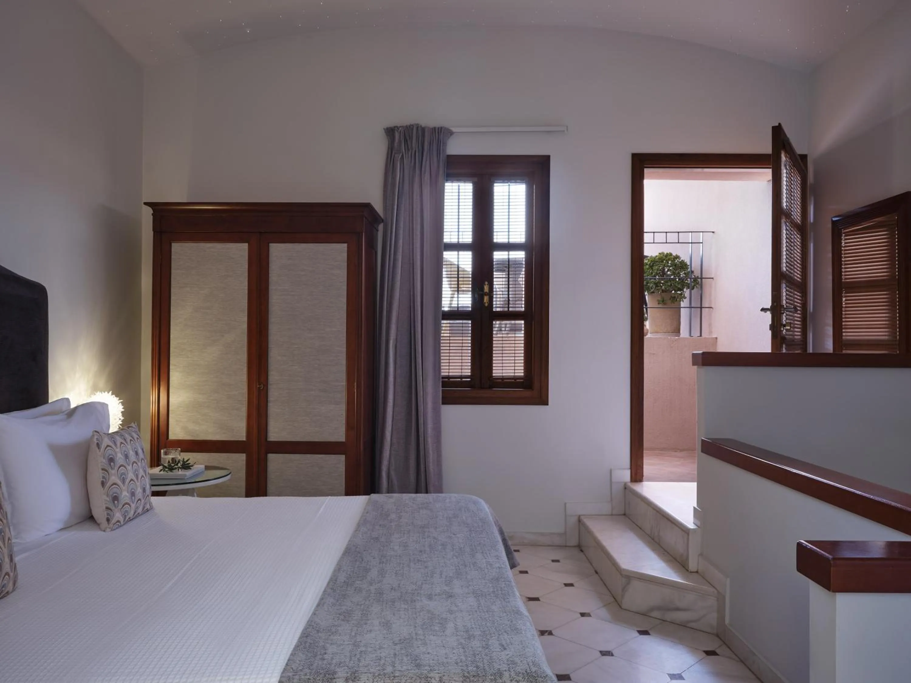 Bed in Casa Delfino Hotel & Spa