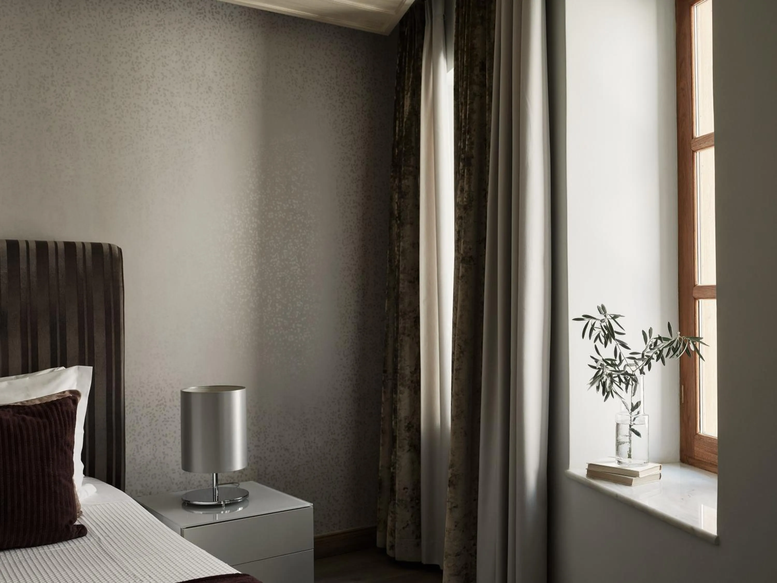 Bed in Casa Delfino Hotel & Spa