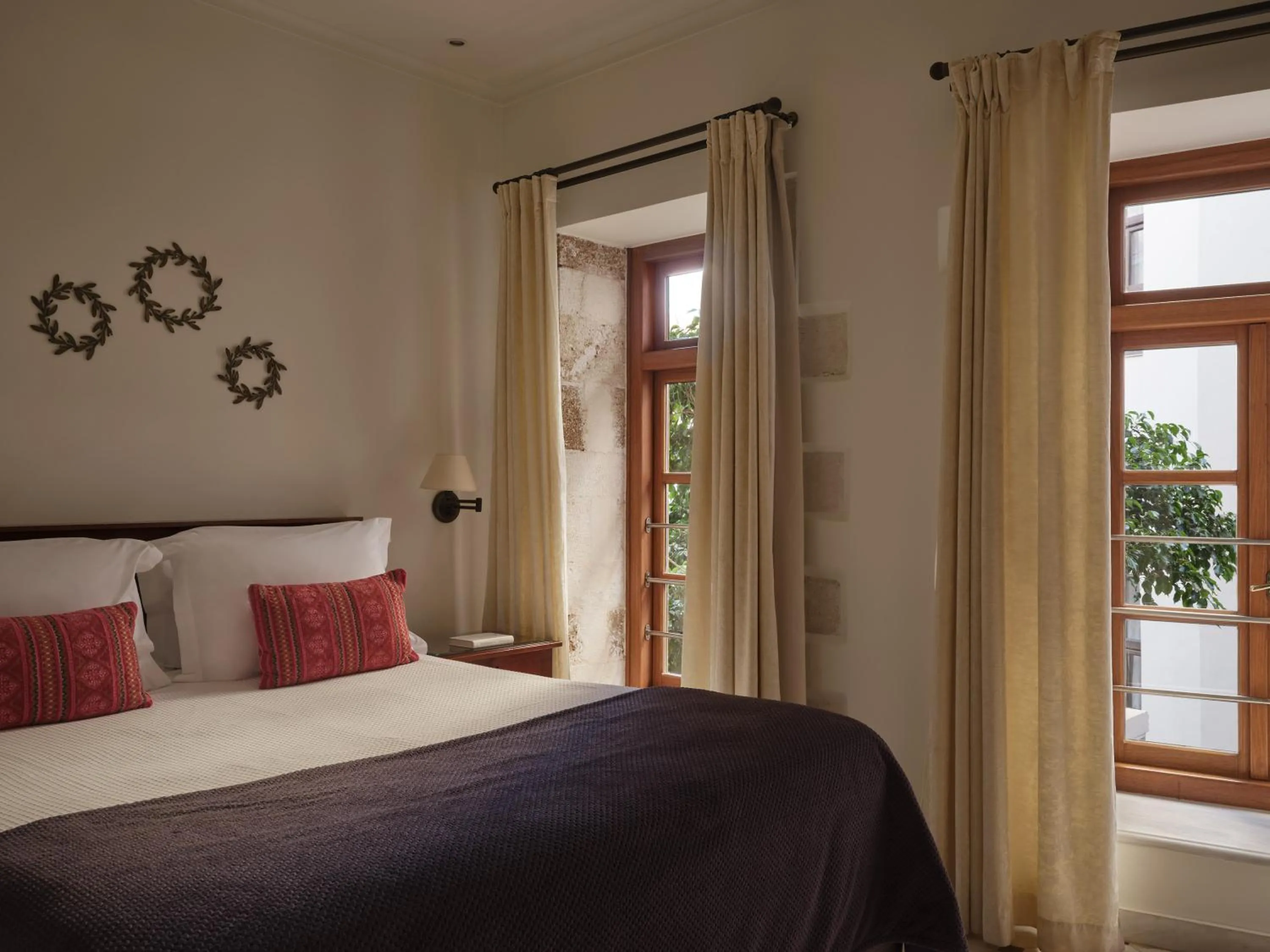 Bed in Casa Delfino Hotel & Spa