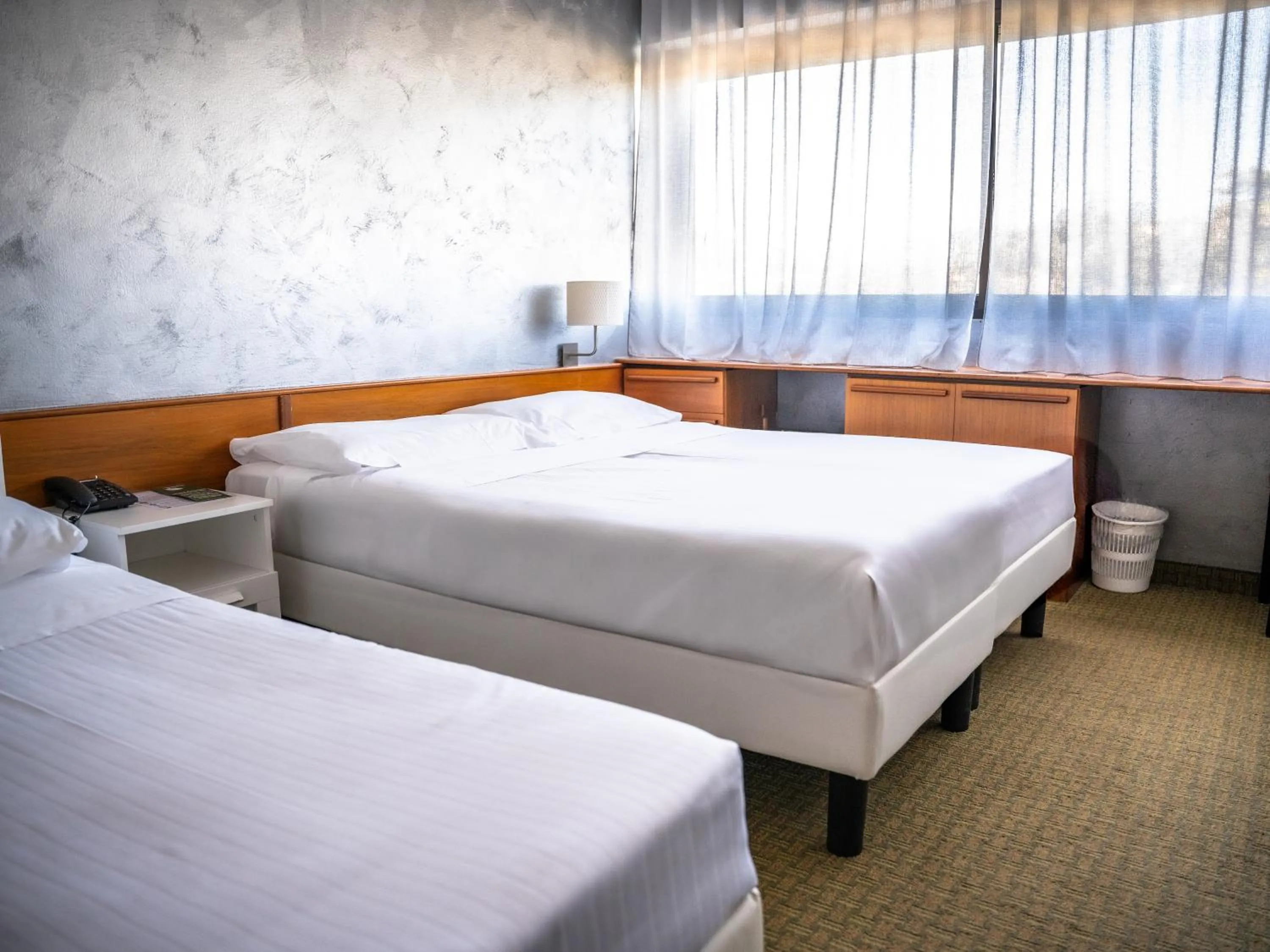 Bed in Hotel Valpolicella International