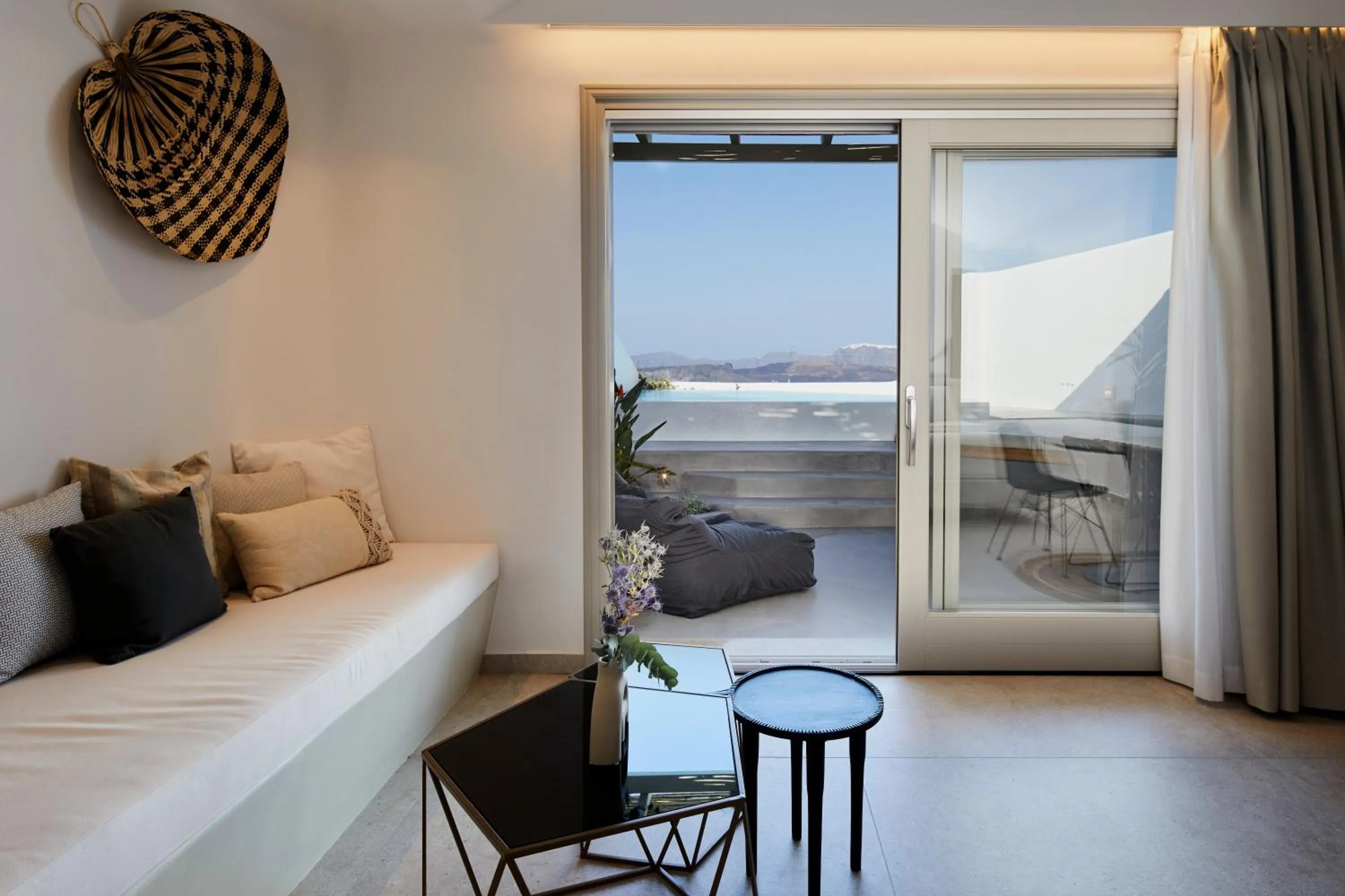 Living room, Bed in Phos The Boutique