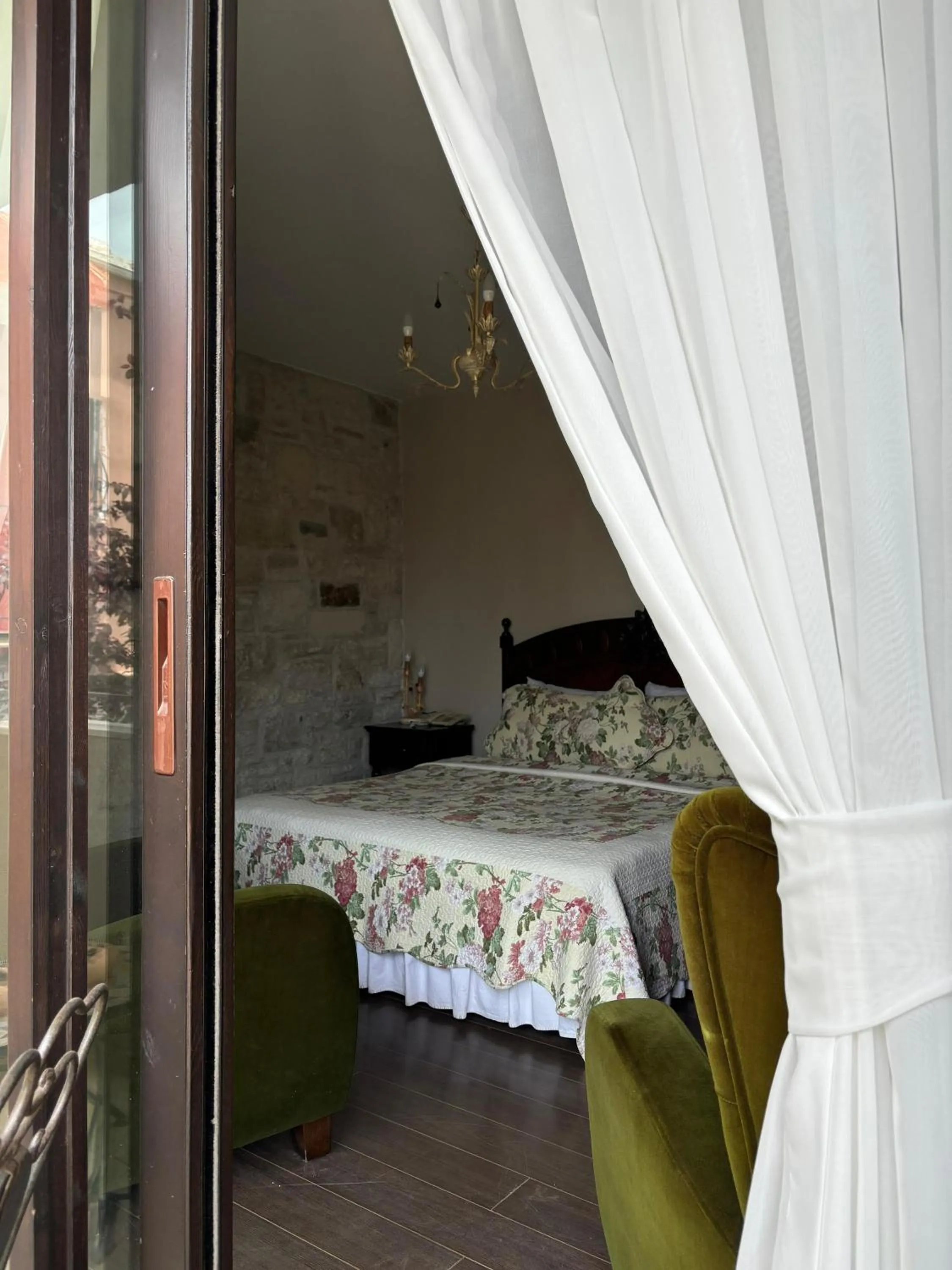 Bed in Griffon Hotel