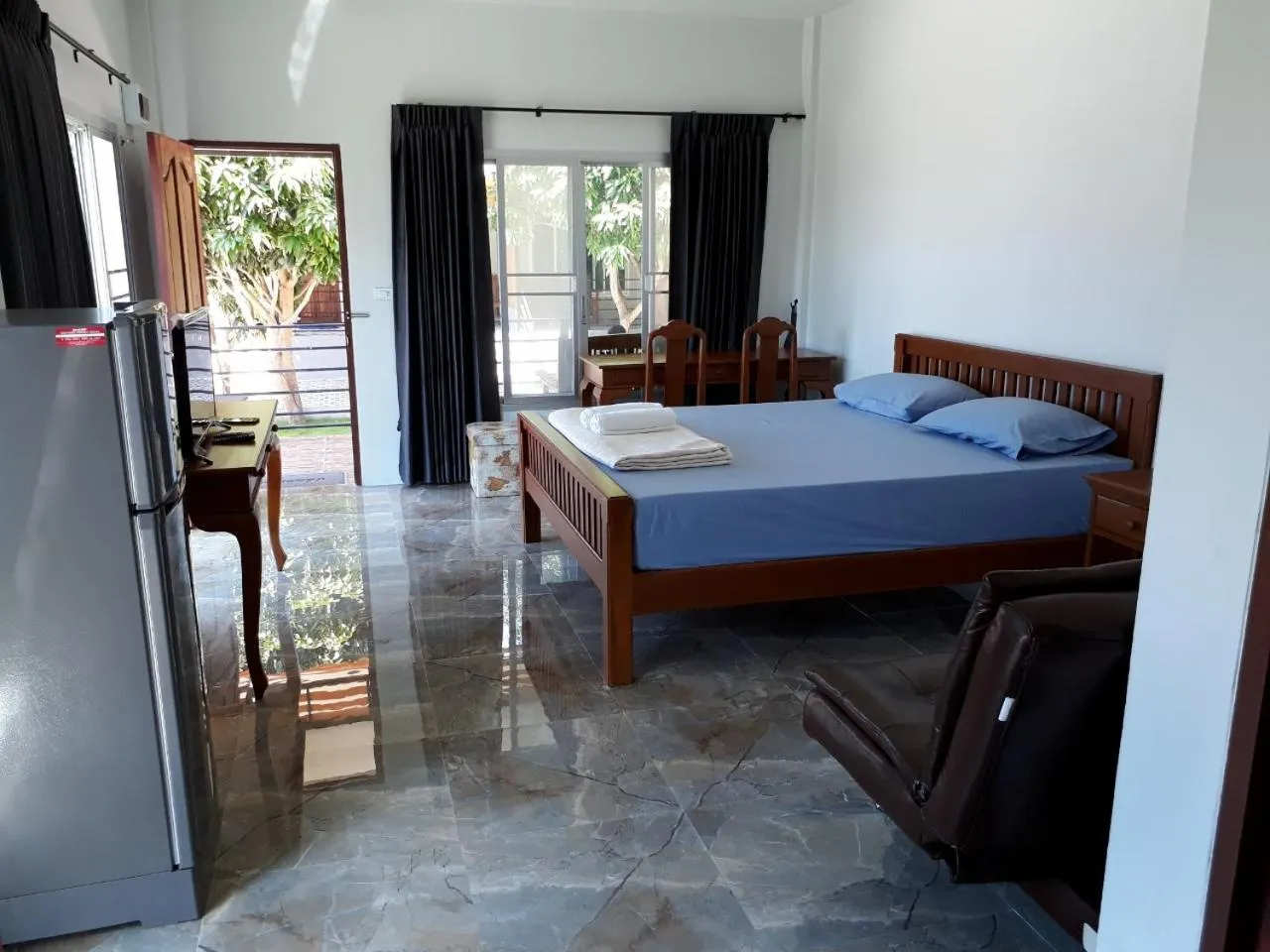 Bed in Green Mango Resort