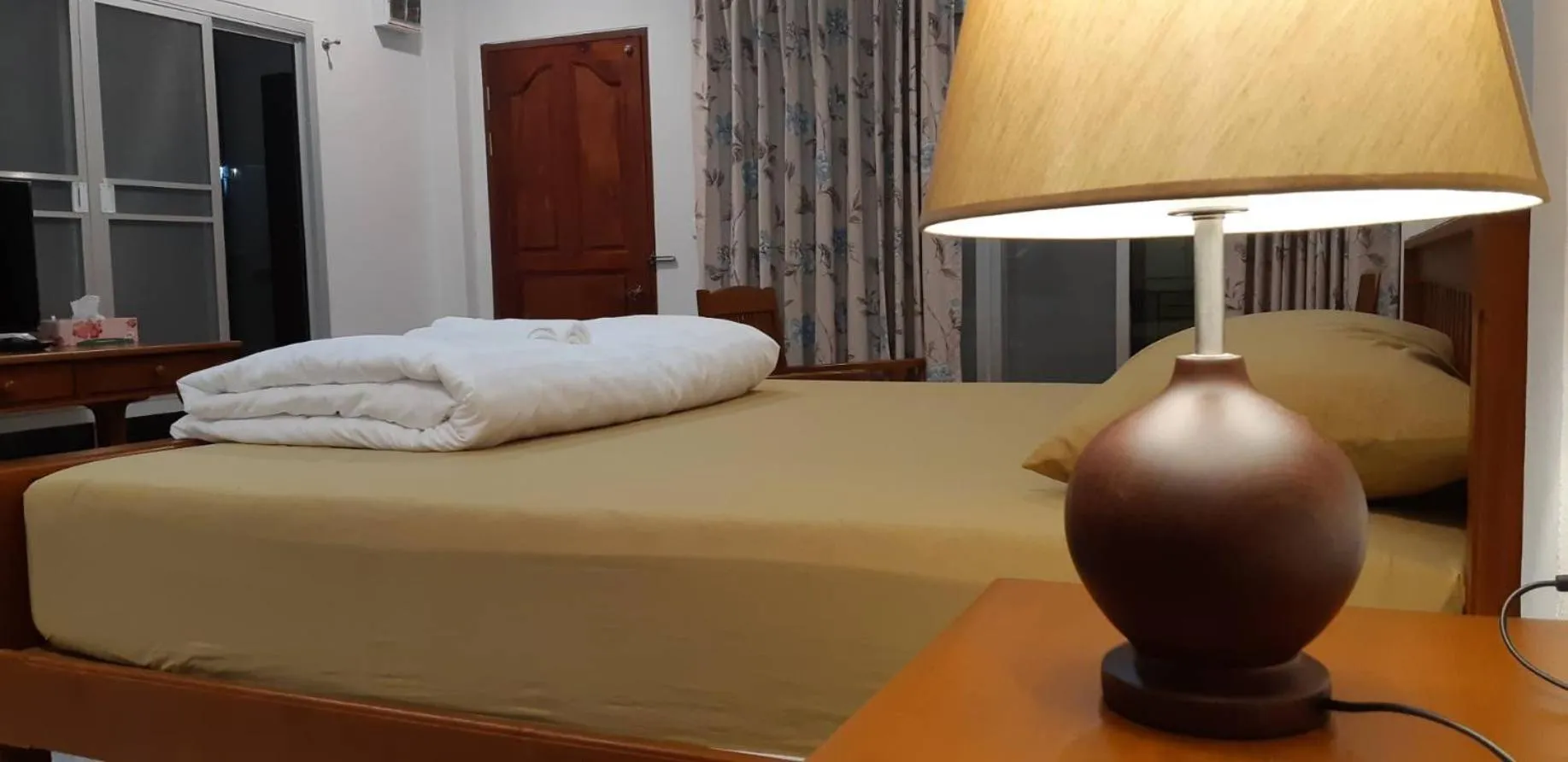 Bed in Green Mango Resort