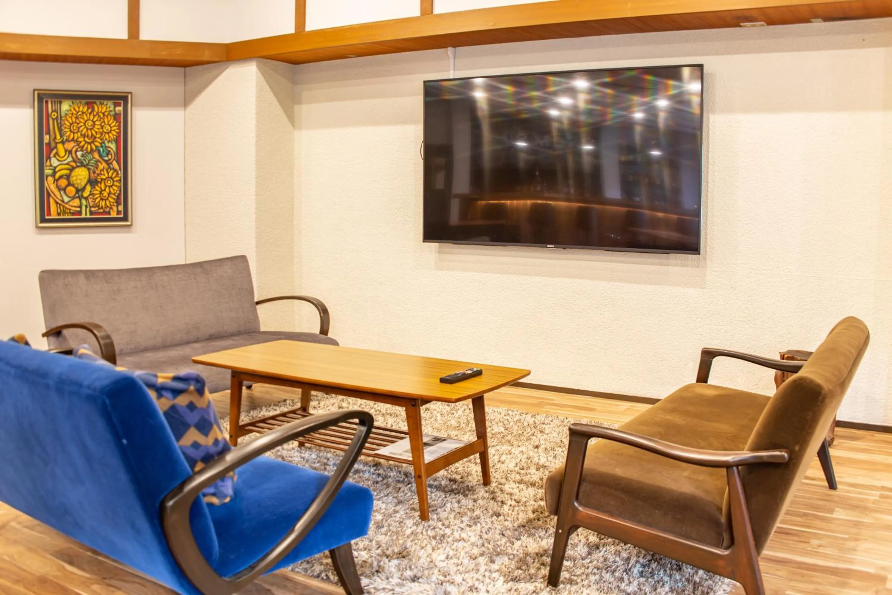Communal lounge/ TV room in Nomad Hakuba