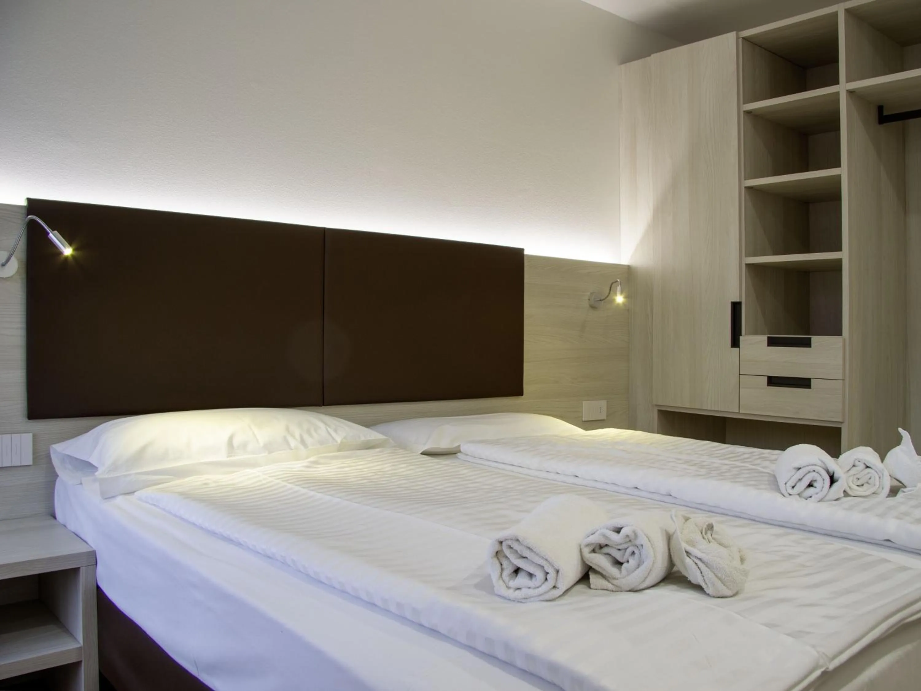 Bed in Liz Hotel & Apartments