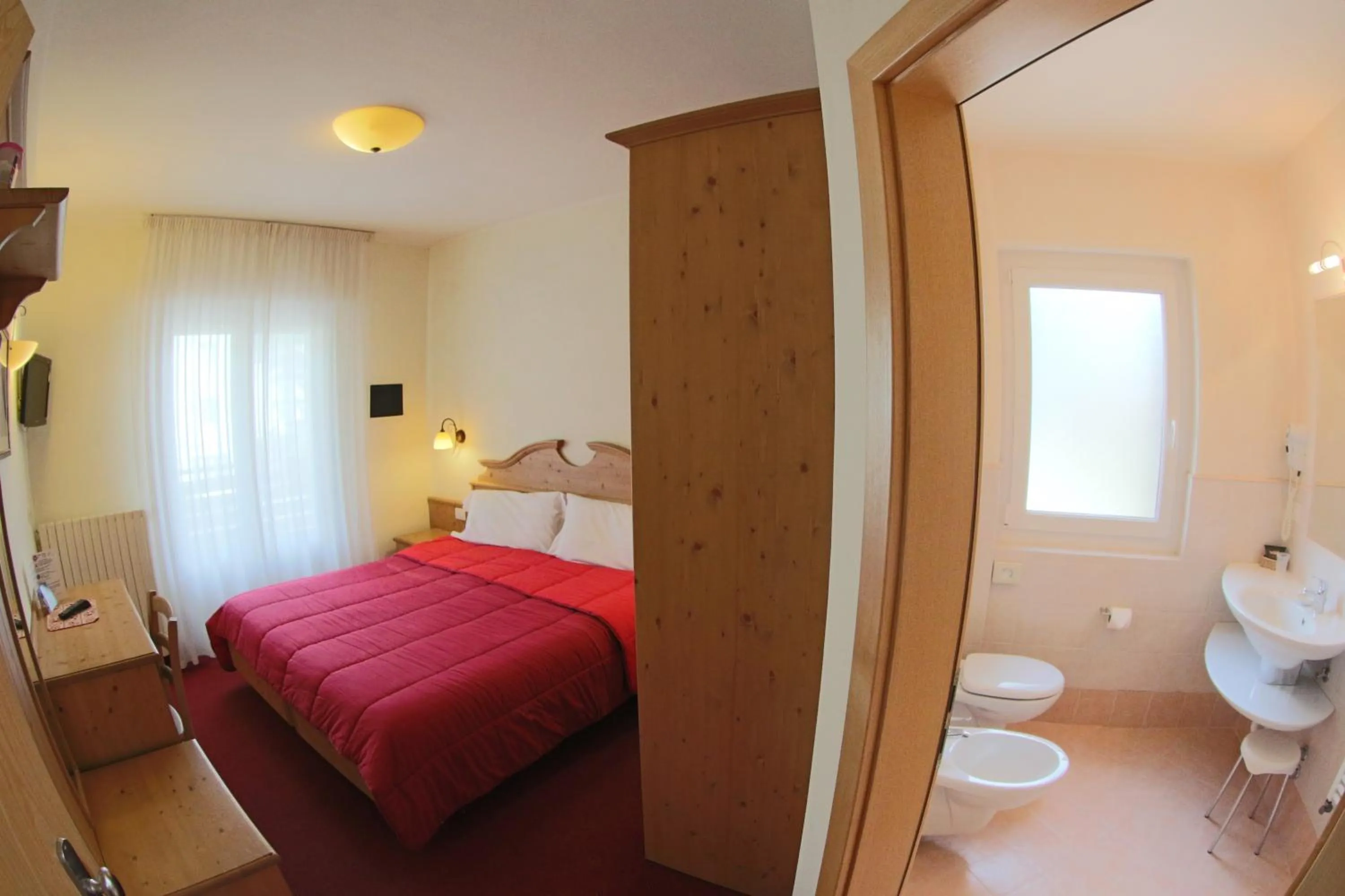 Bed in Liz Hotel & Apartments