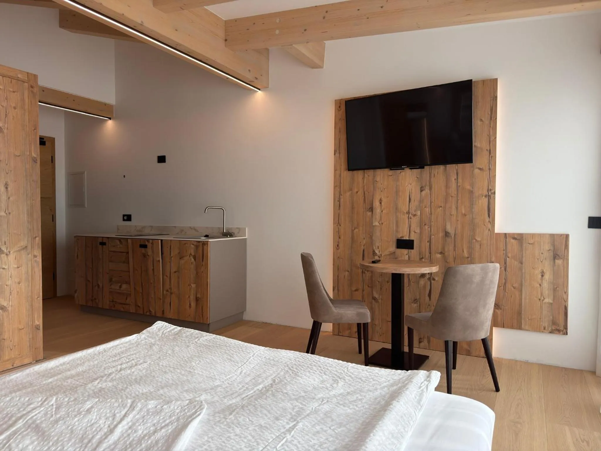 Bed in Liz Hotel & Apartments