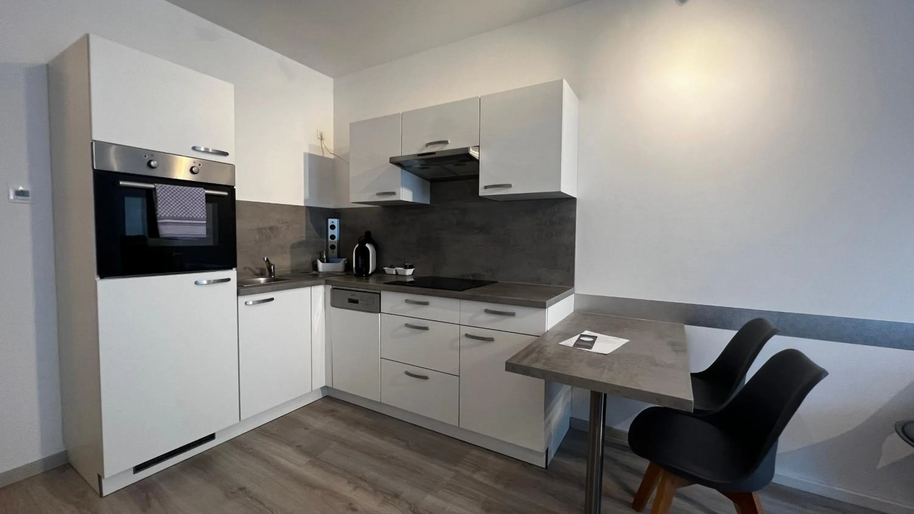 Kitchen or kitchenette in Blue Riverside Apartments