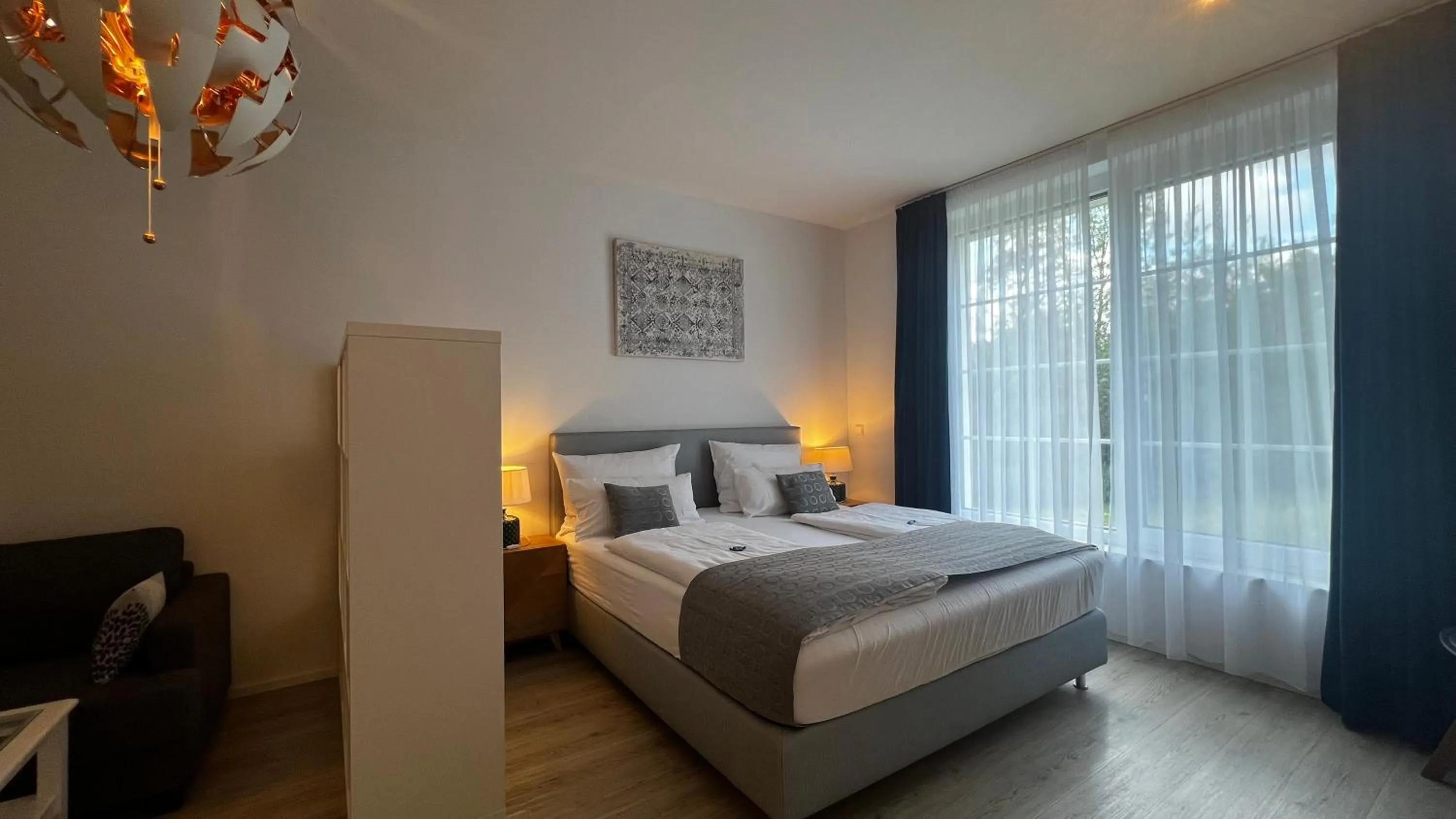 Bed in Blue Riverside Apartments