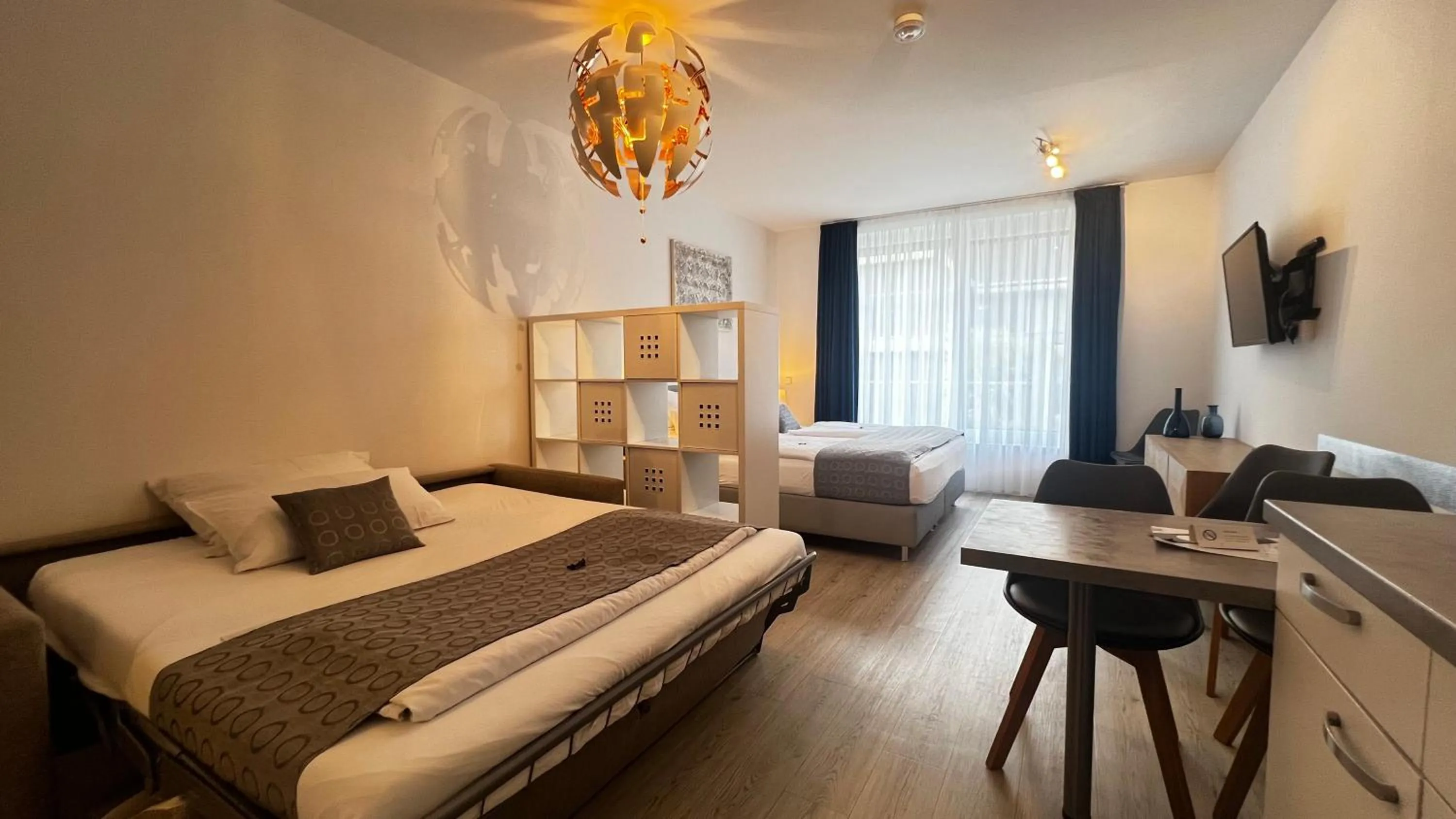 Photo of the whole room, Bed in Blue Riverside Apartments