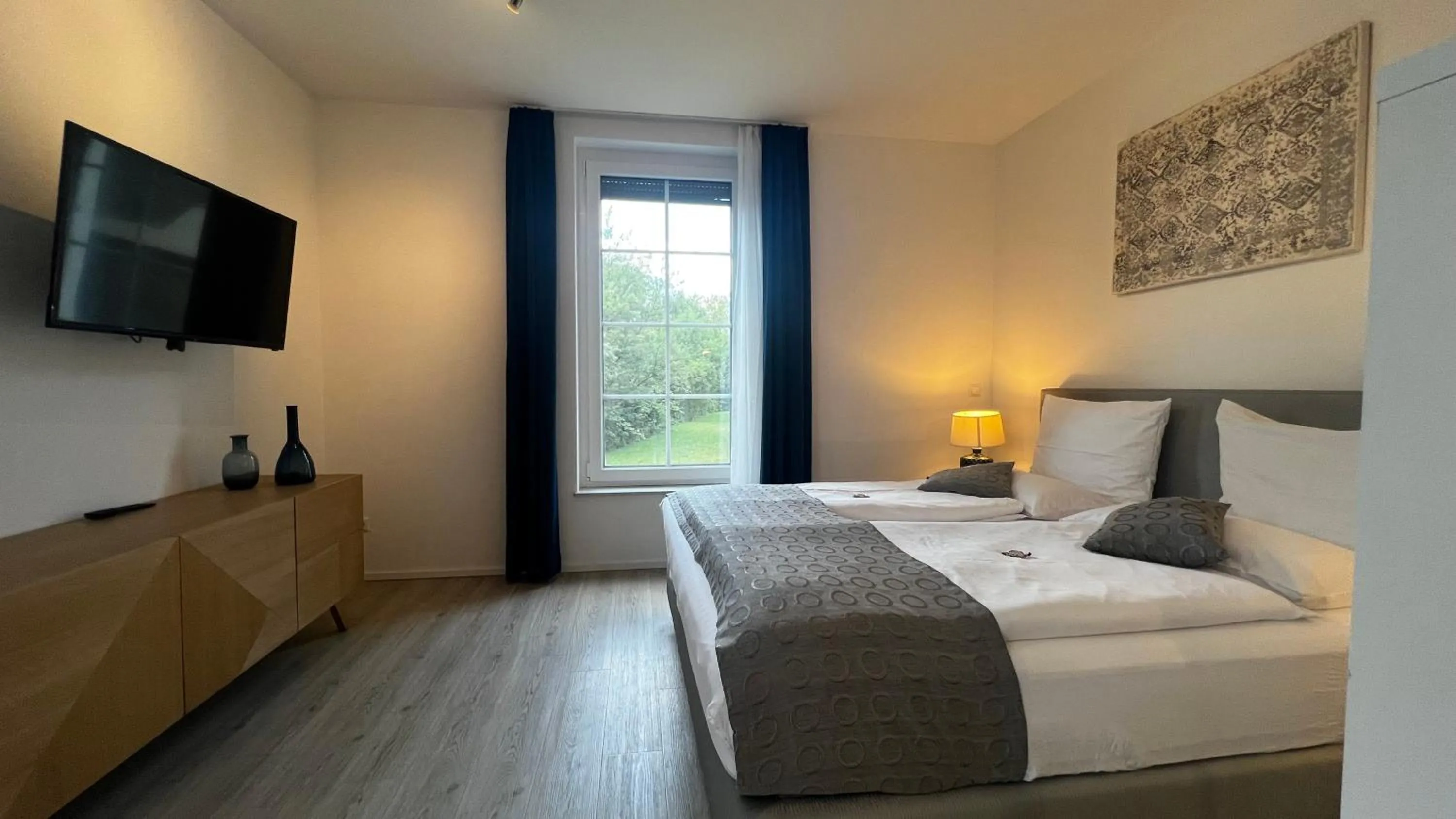 Bed in Blue Riverside Apartments