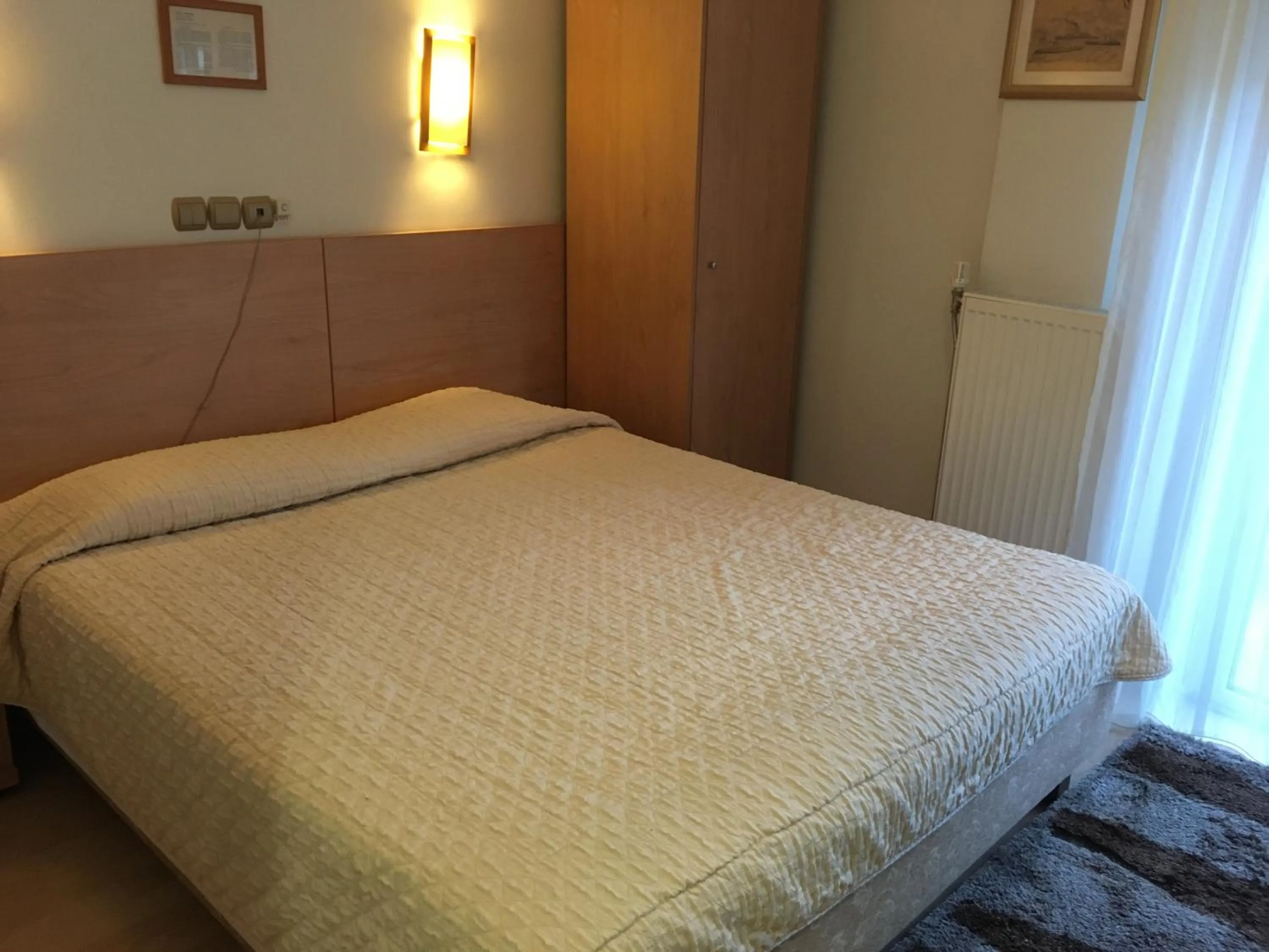 Bed in Hotel Orestion - Bike and motorcycle friendly hotel