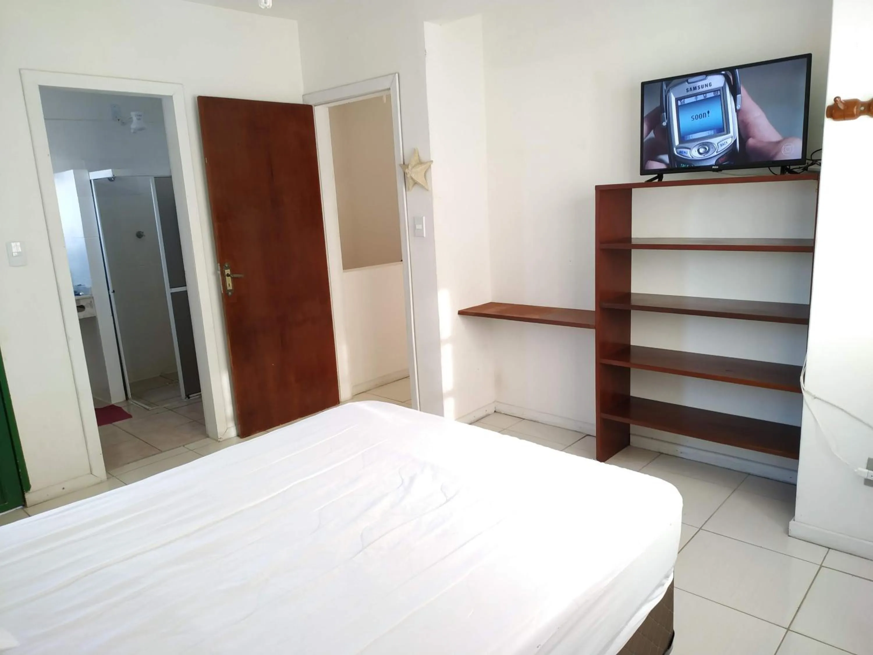 Bed in Residencial Praia Bombas