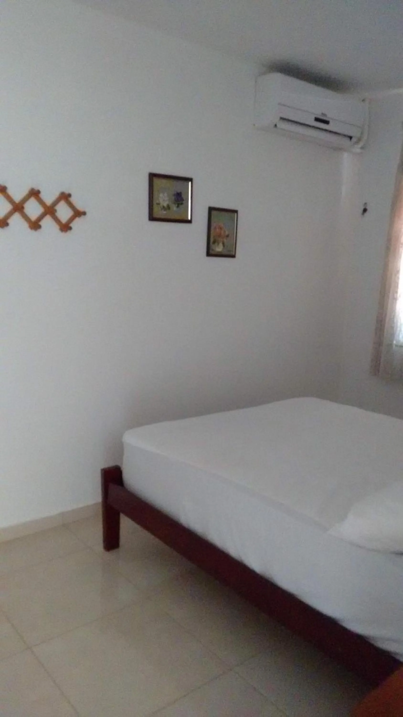 Bed in Residencial Praia Bombas
