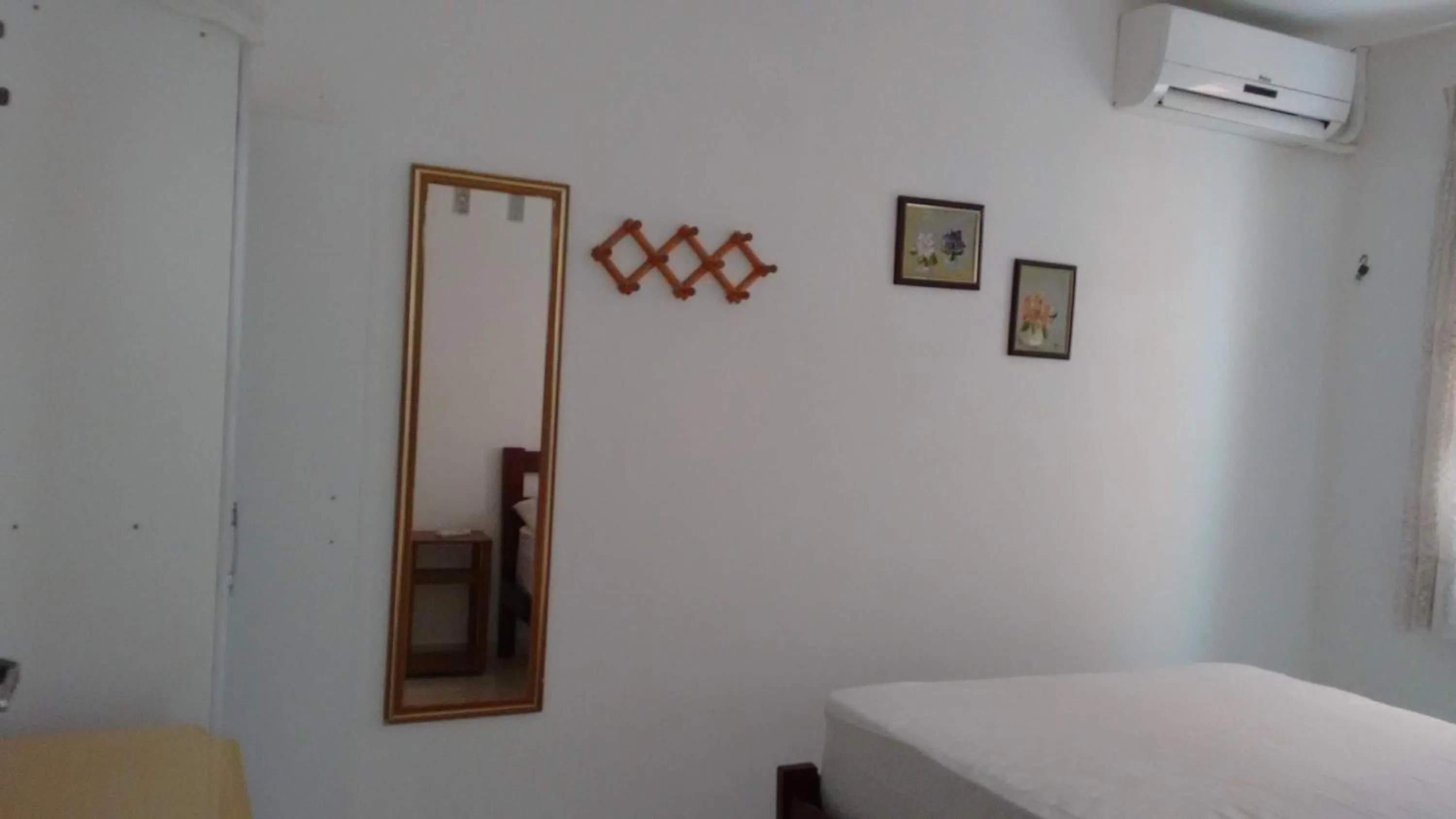 Bed in Residencial Praia Bombas