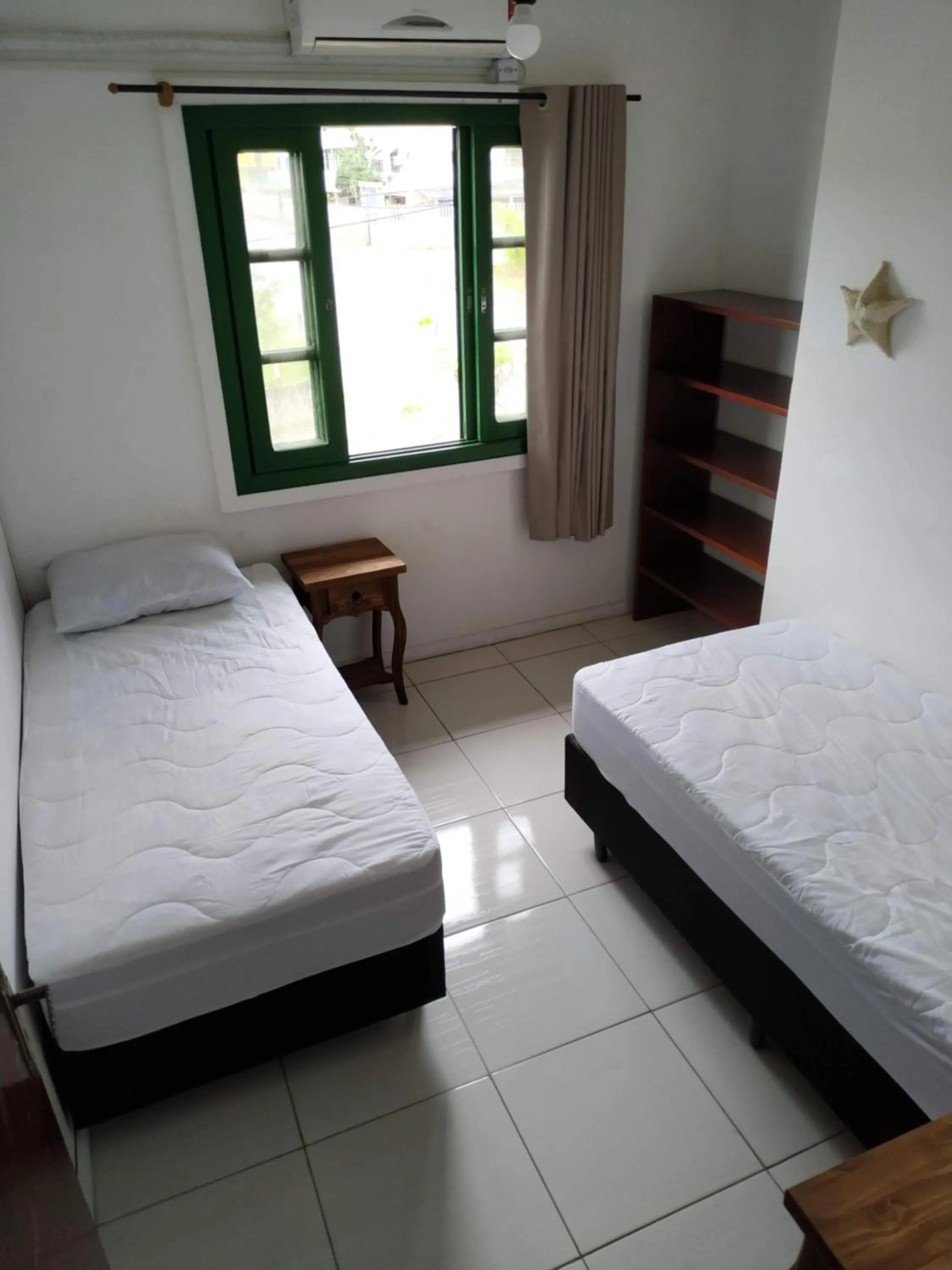 Bed in Residencial Praia Bombas