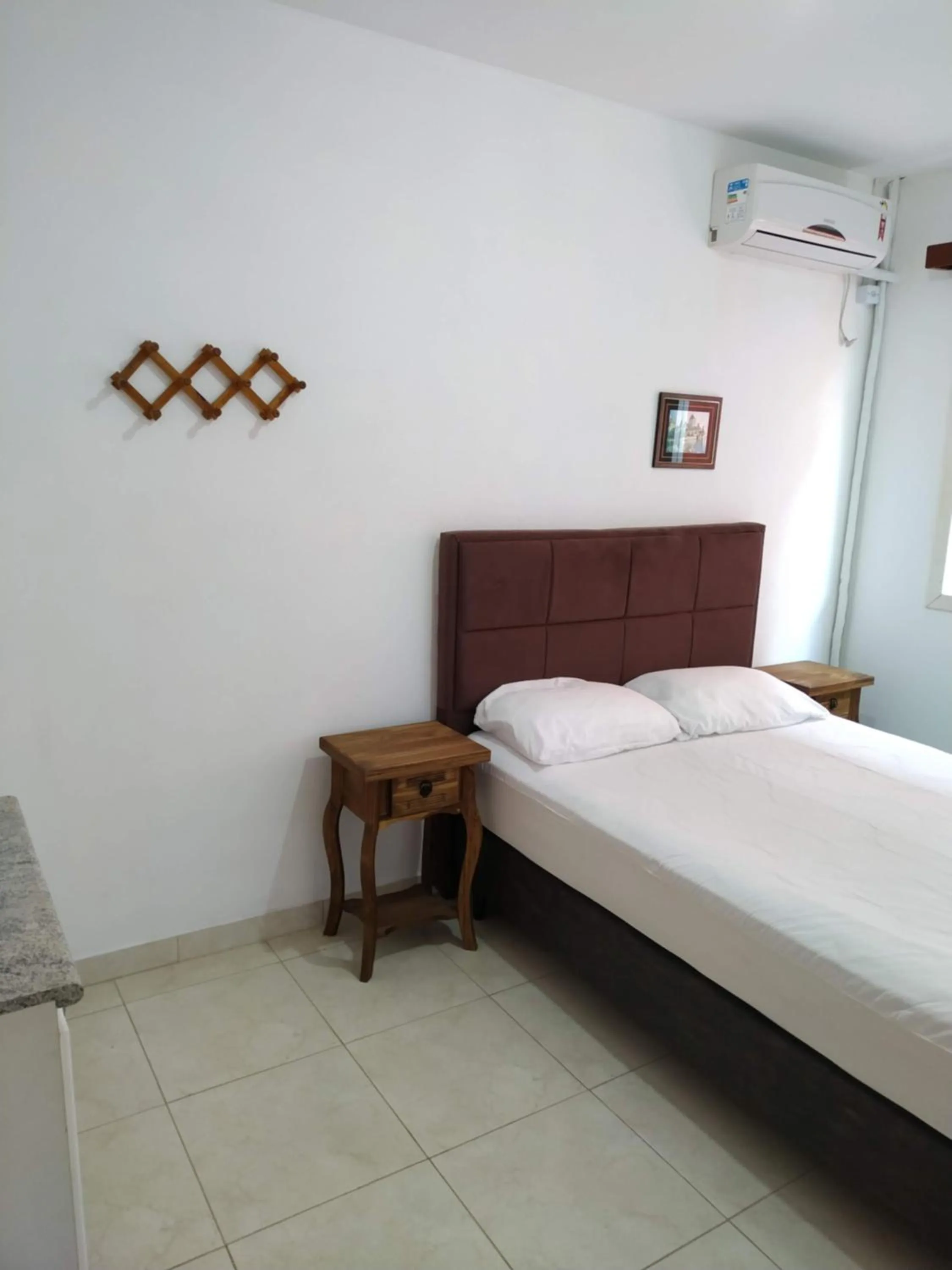 Bed in Residencial Praia Bombas