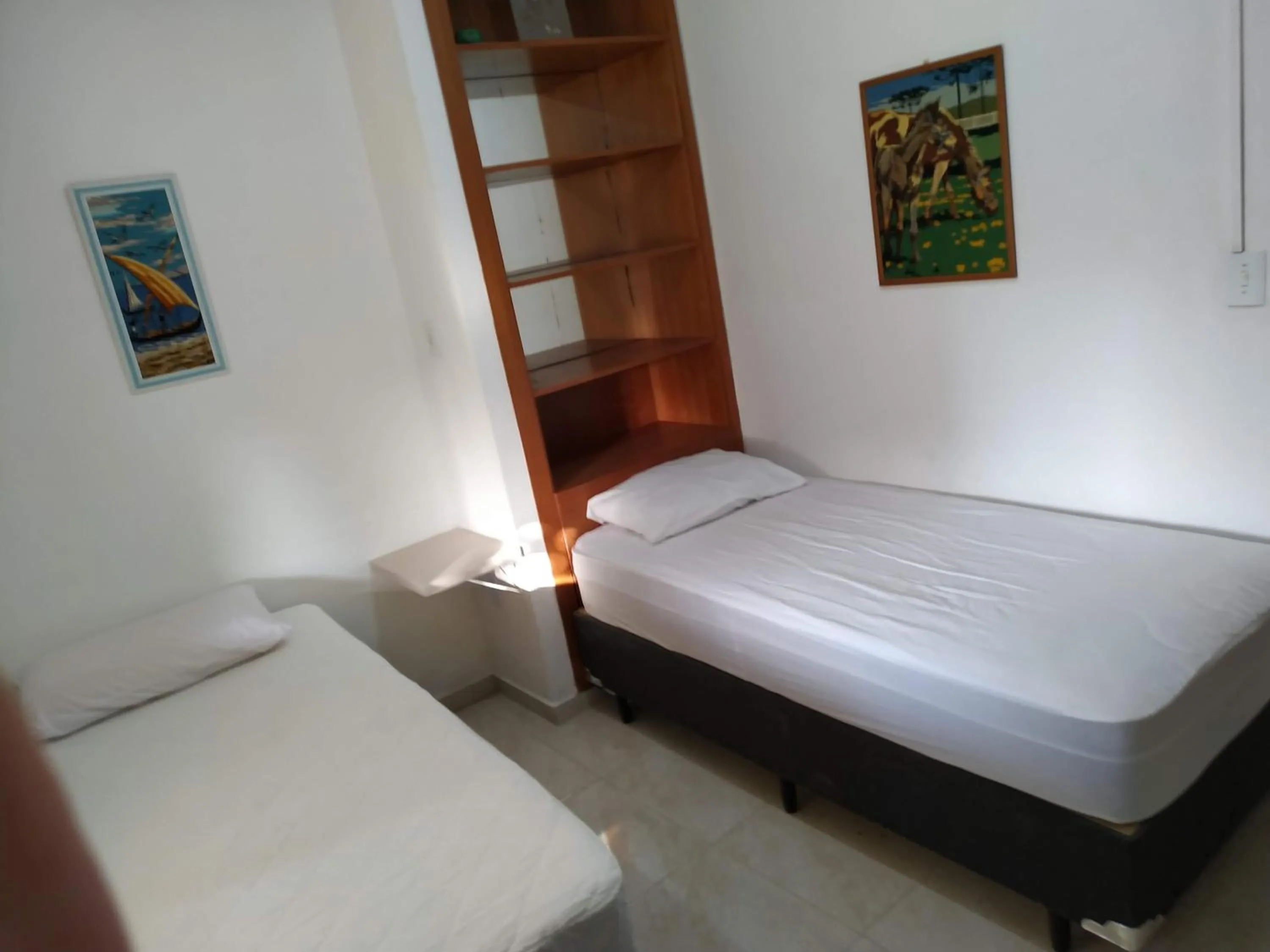 Bed in Residencial Praia Bombas