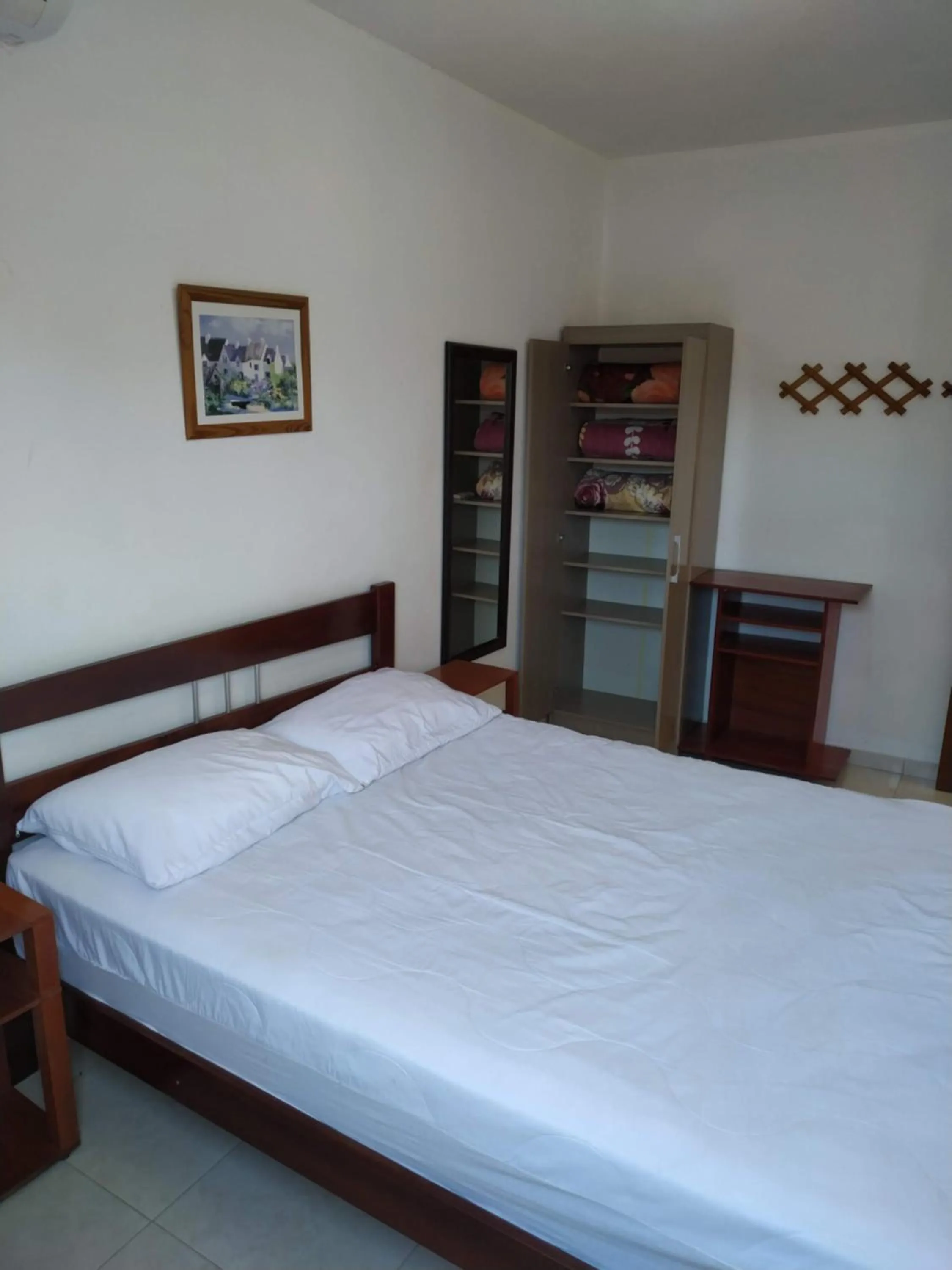 Bed in Residencial Praia Bombas