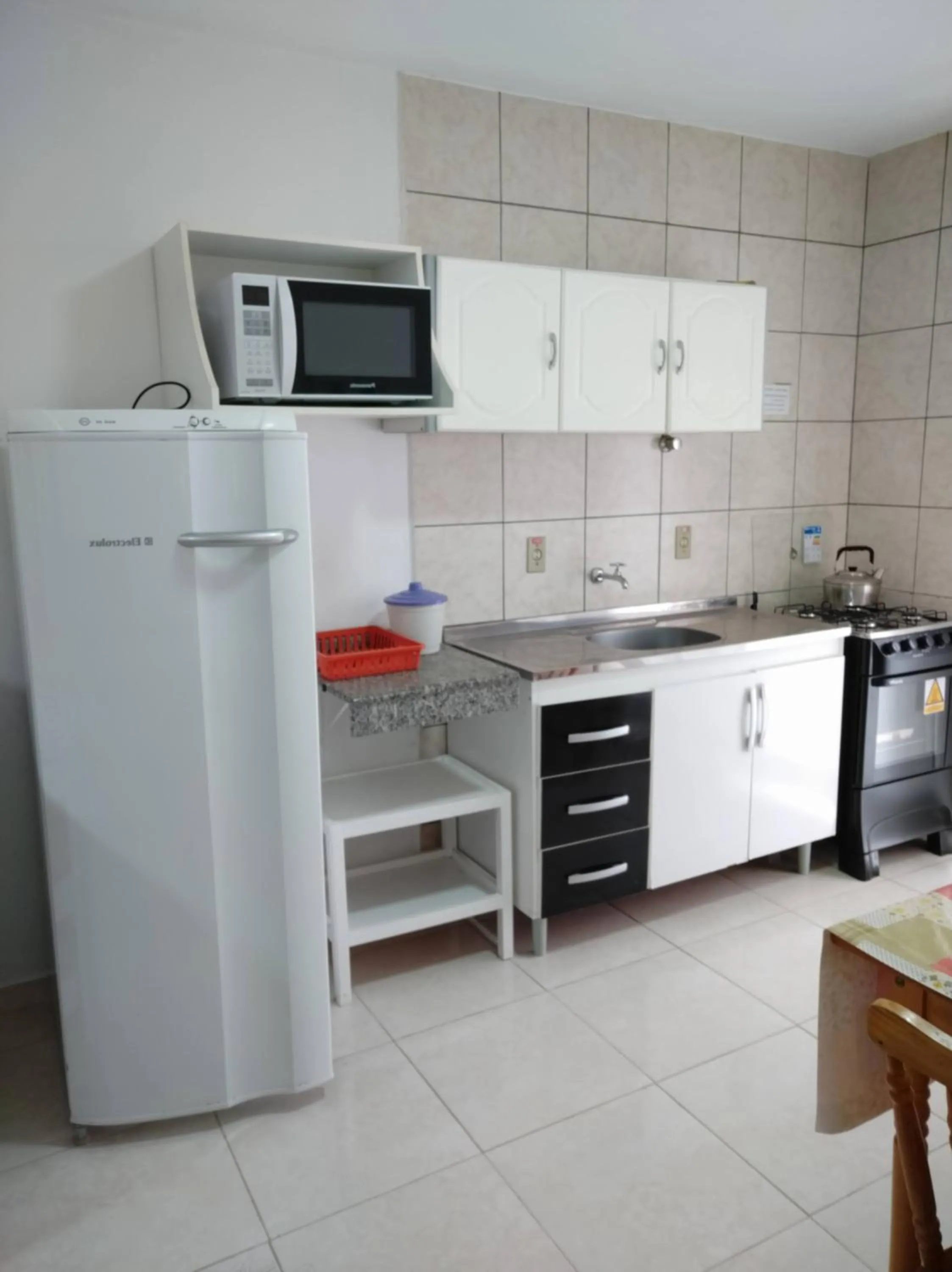 Kitchen or kitchenette in Residencial Praia Bombas