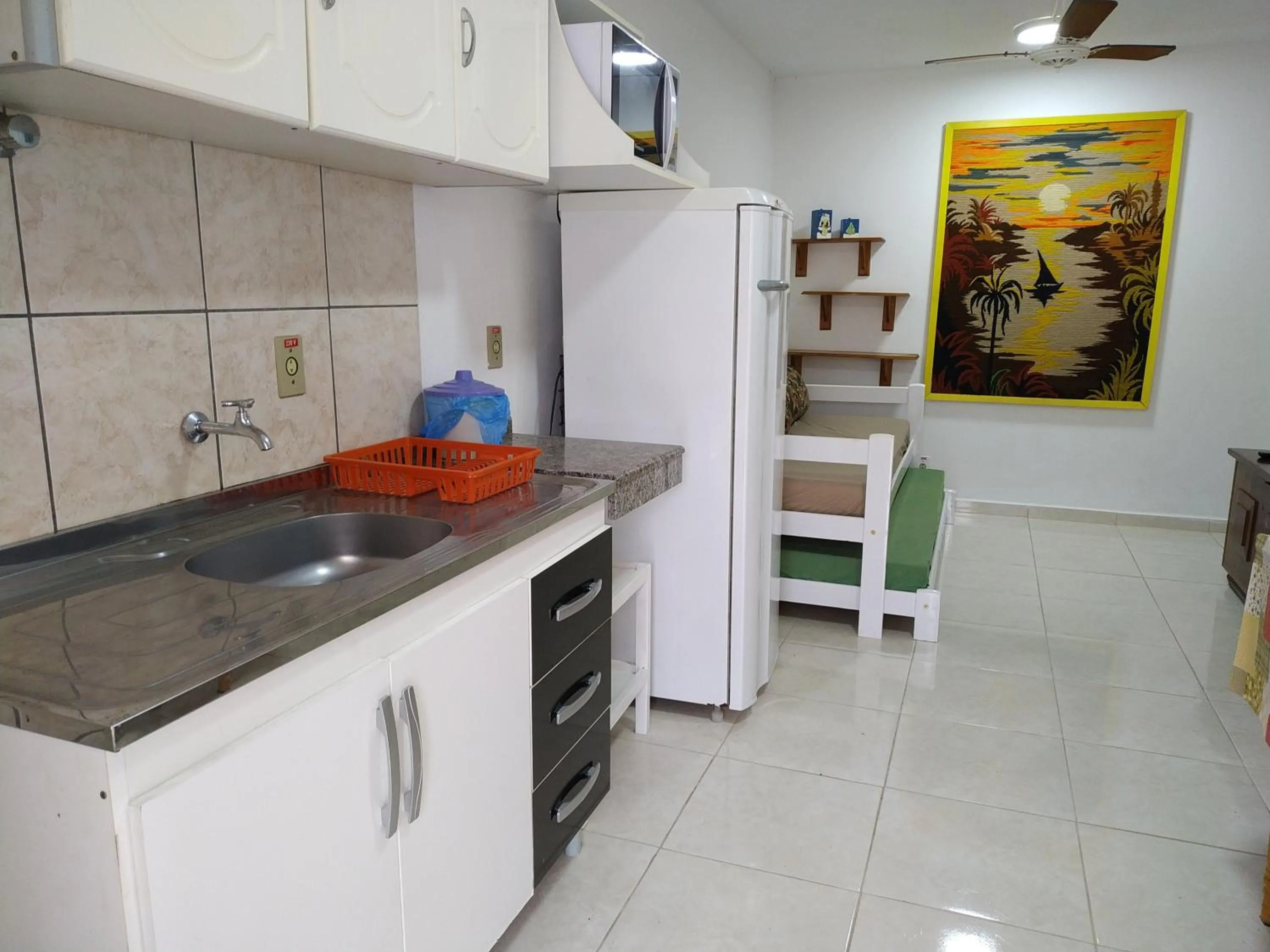Kitchen or kitchenette in Residencial Praia Bombas