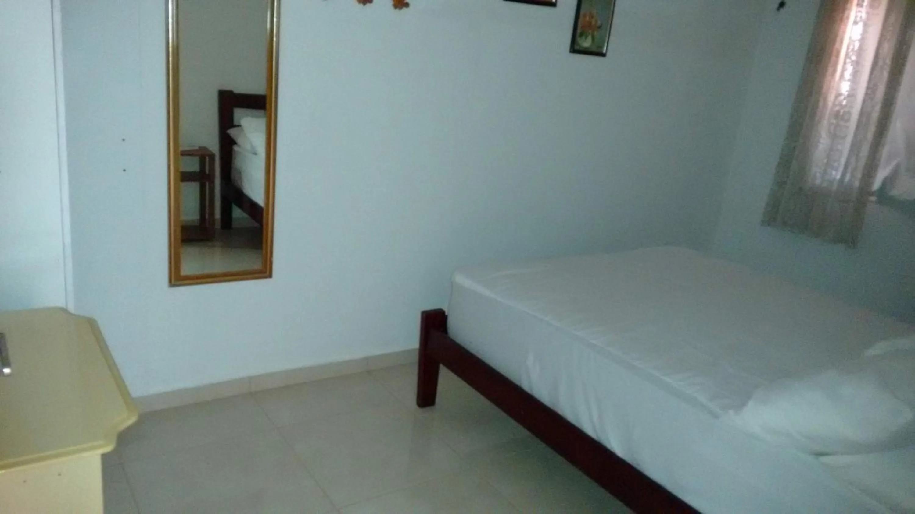 Bed in Residencial Praia Bombas