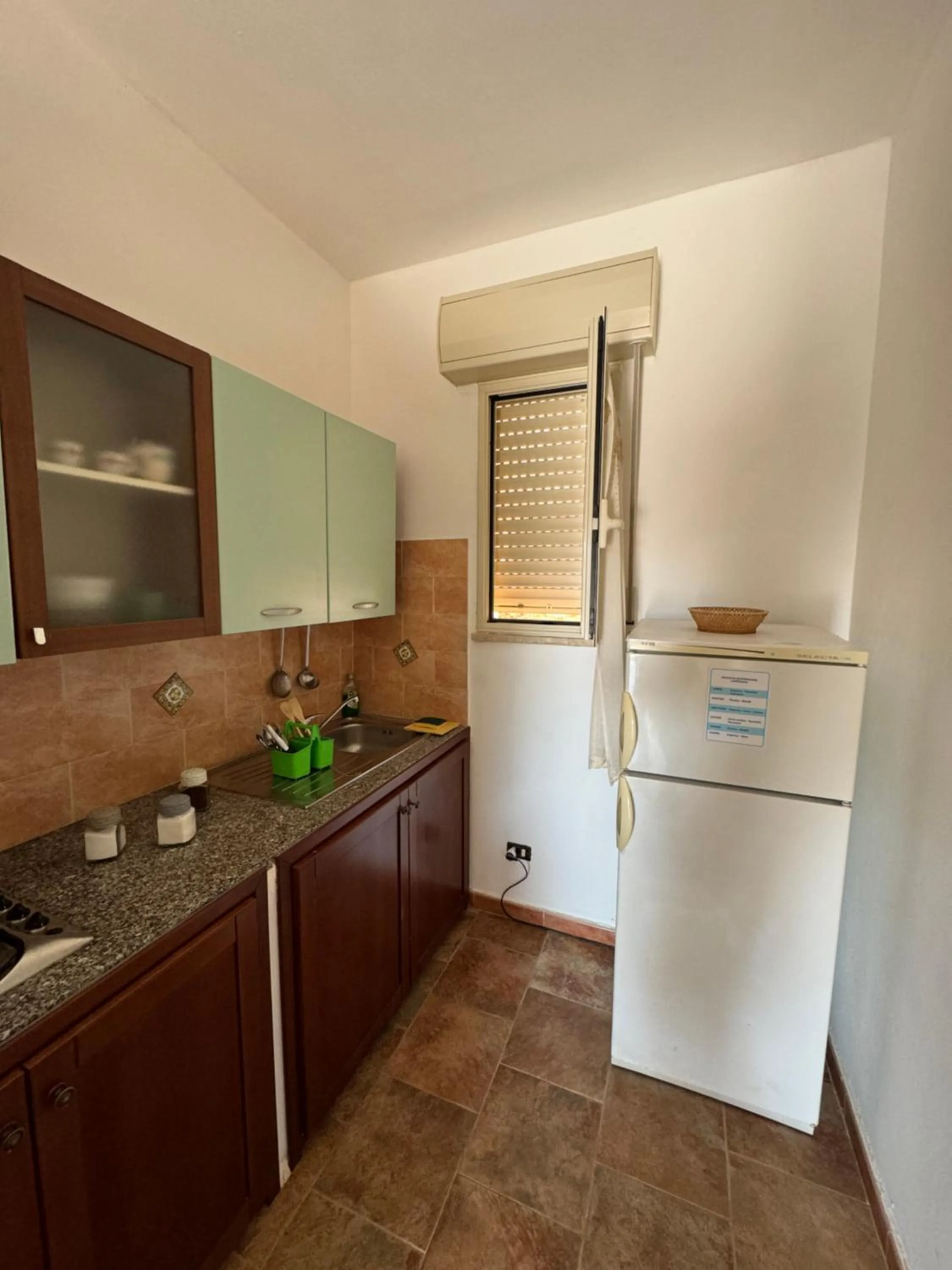 Kitchen or kitchenette in Residence La Conchiglia