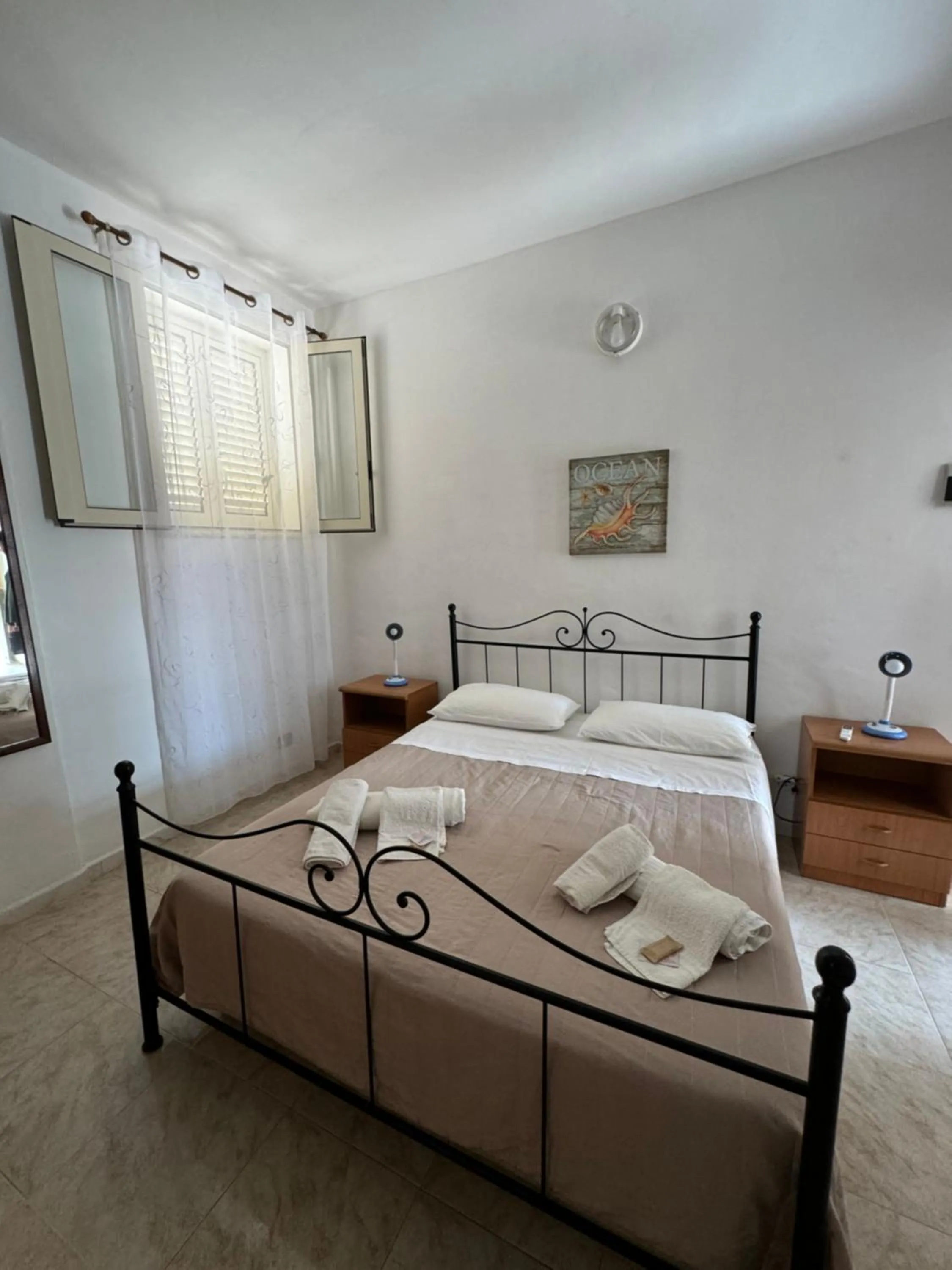 Photo of the whole room, Bed in Residence La Conchiglia