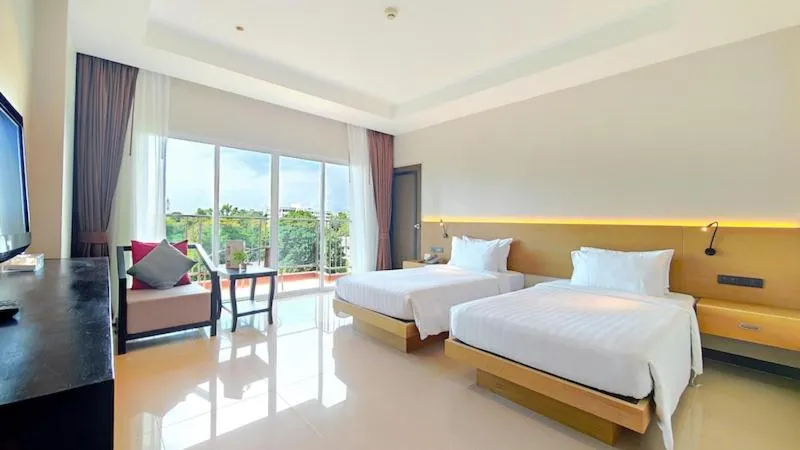 Bed in Prima Hotel Pattaya