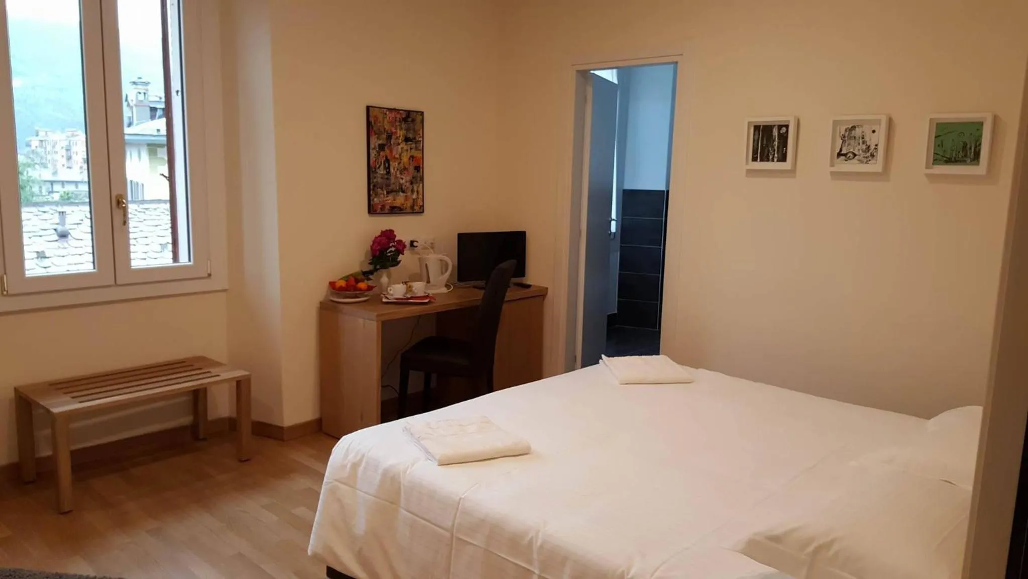 Photo of the whole room, Bed in Hotel Trieste