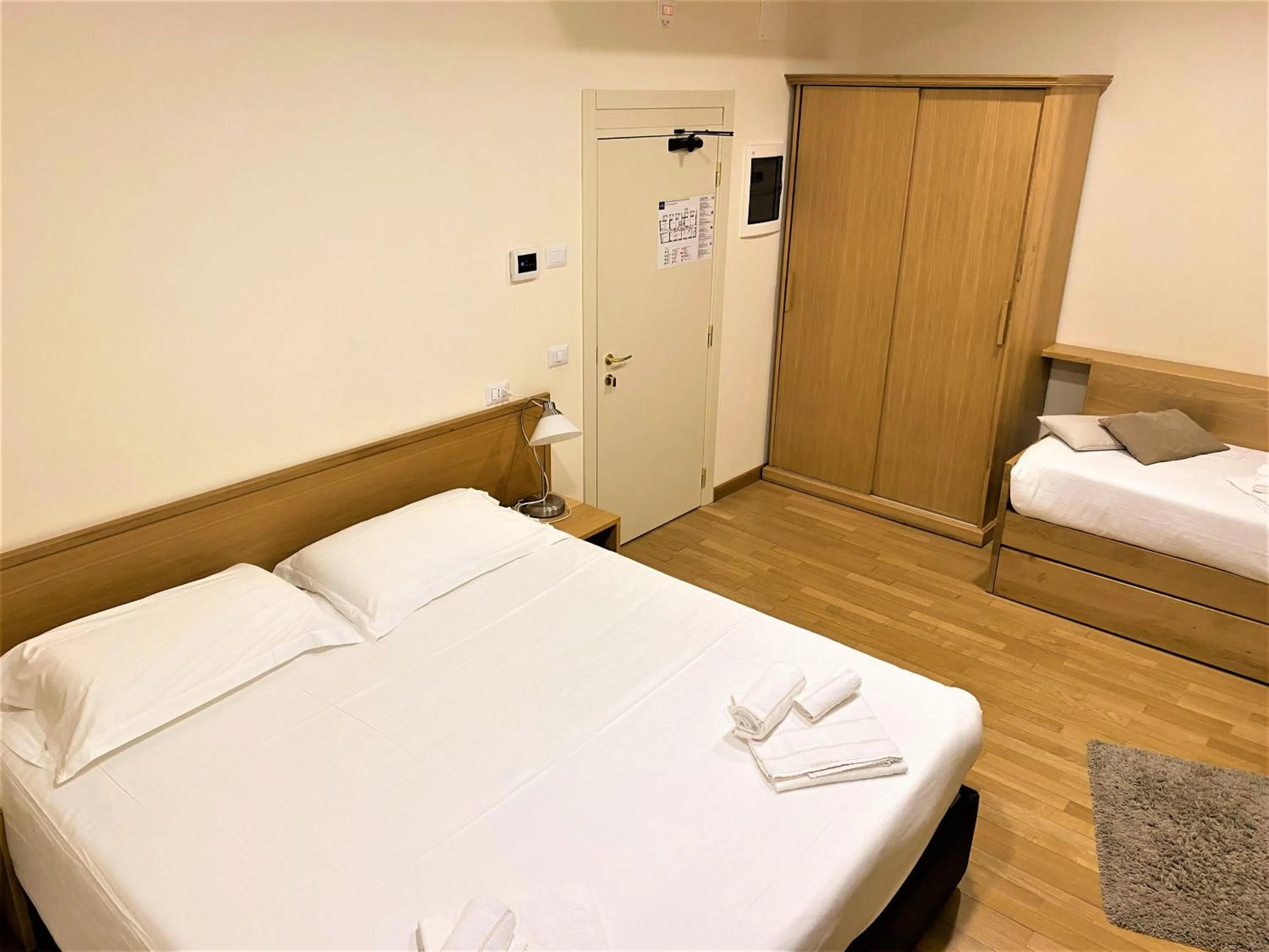 Bed in Hotel Trieste