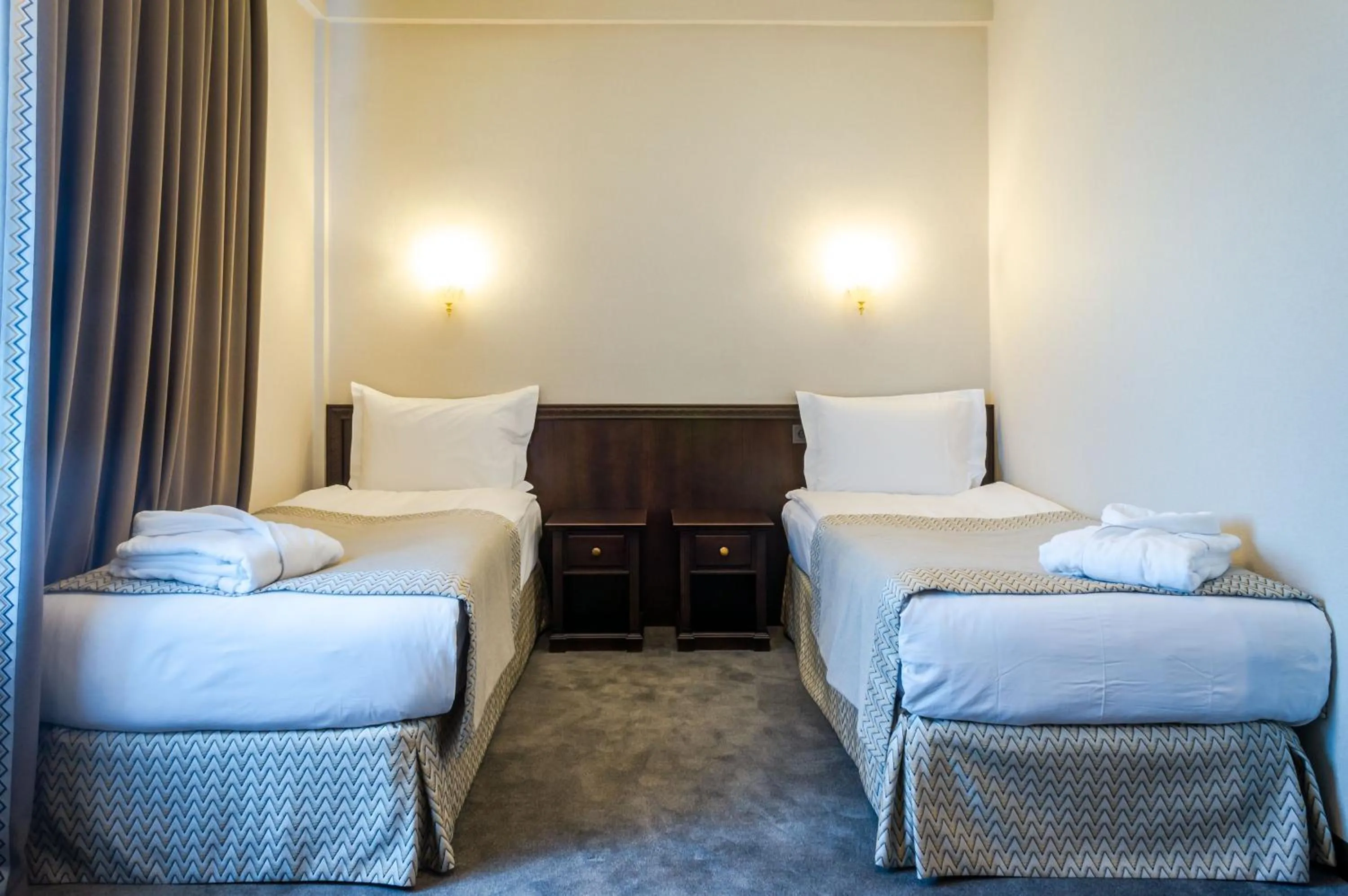 Bed in Royal Palace Hotel