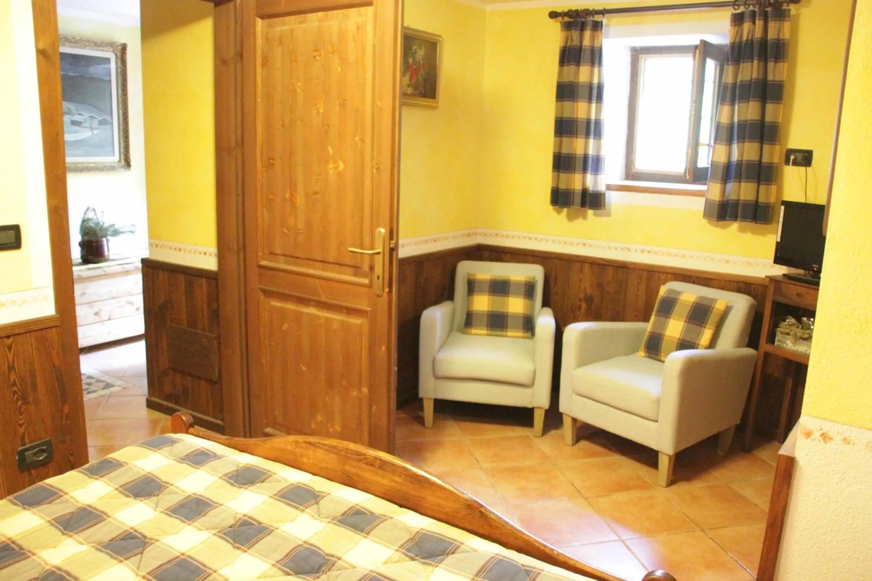 Bed in Chambres D'Hotes Les Fleurs