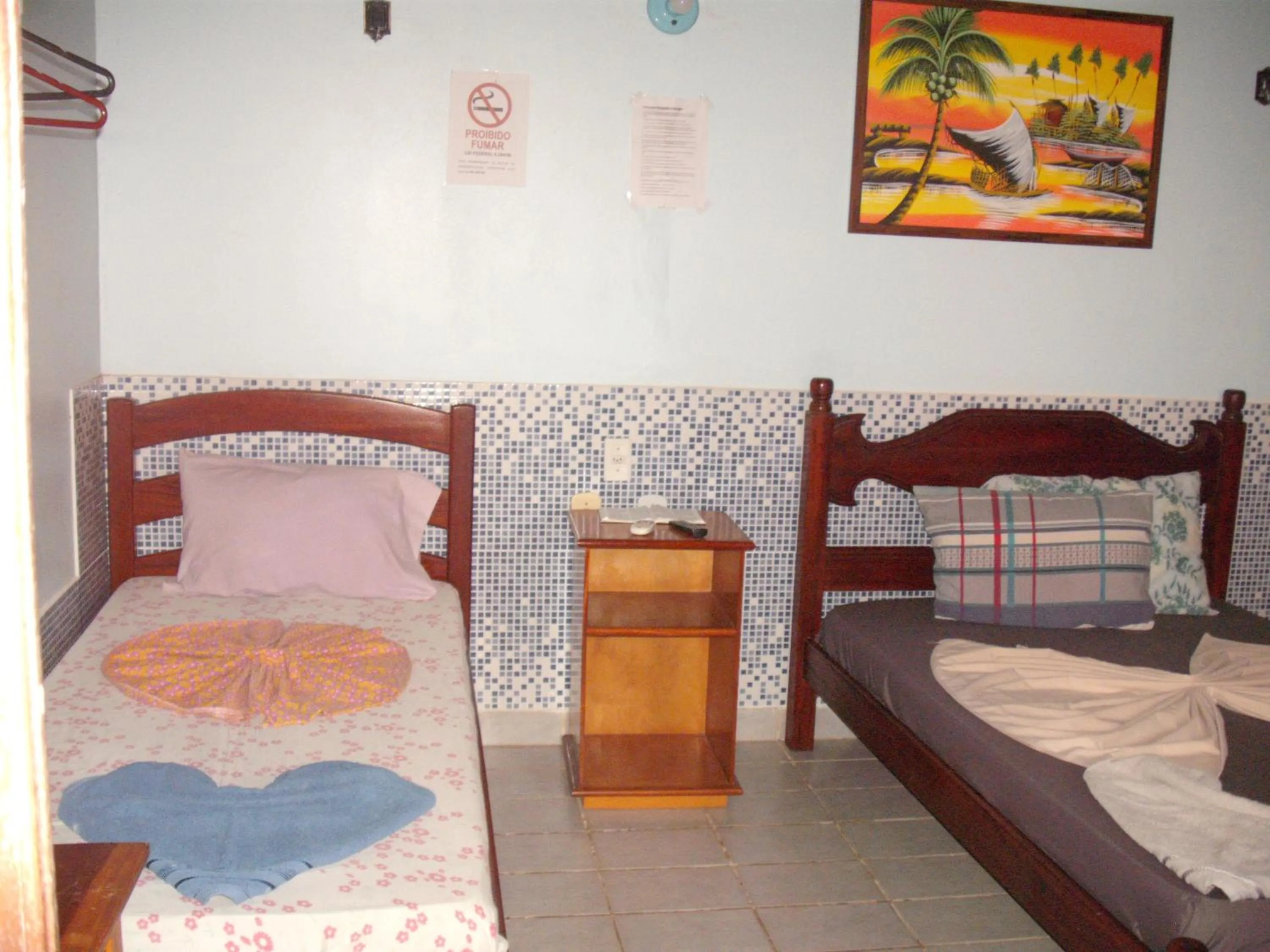 Photo of the whole room, Bed in Pousada Chalé Suiço