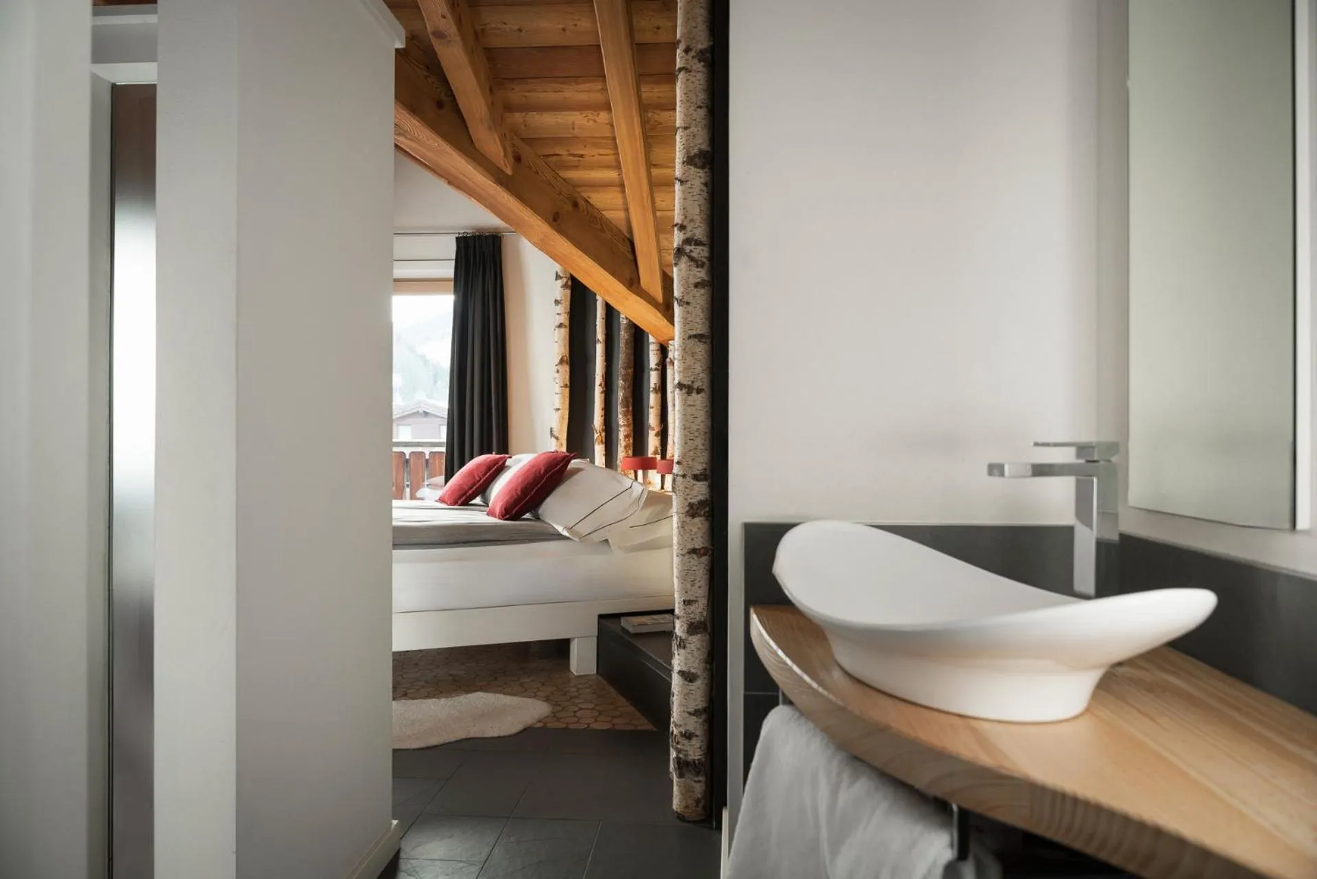 Photo of the whole room, Bed in Alpen Hotel Chalet