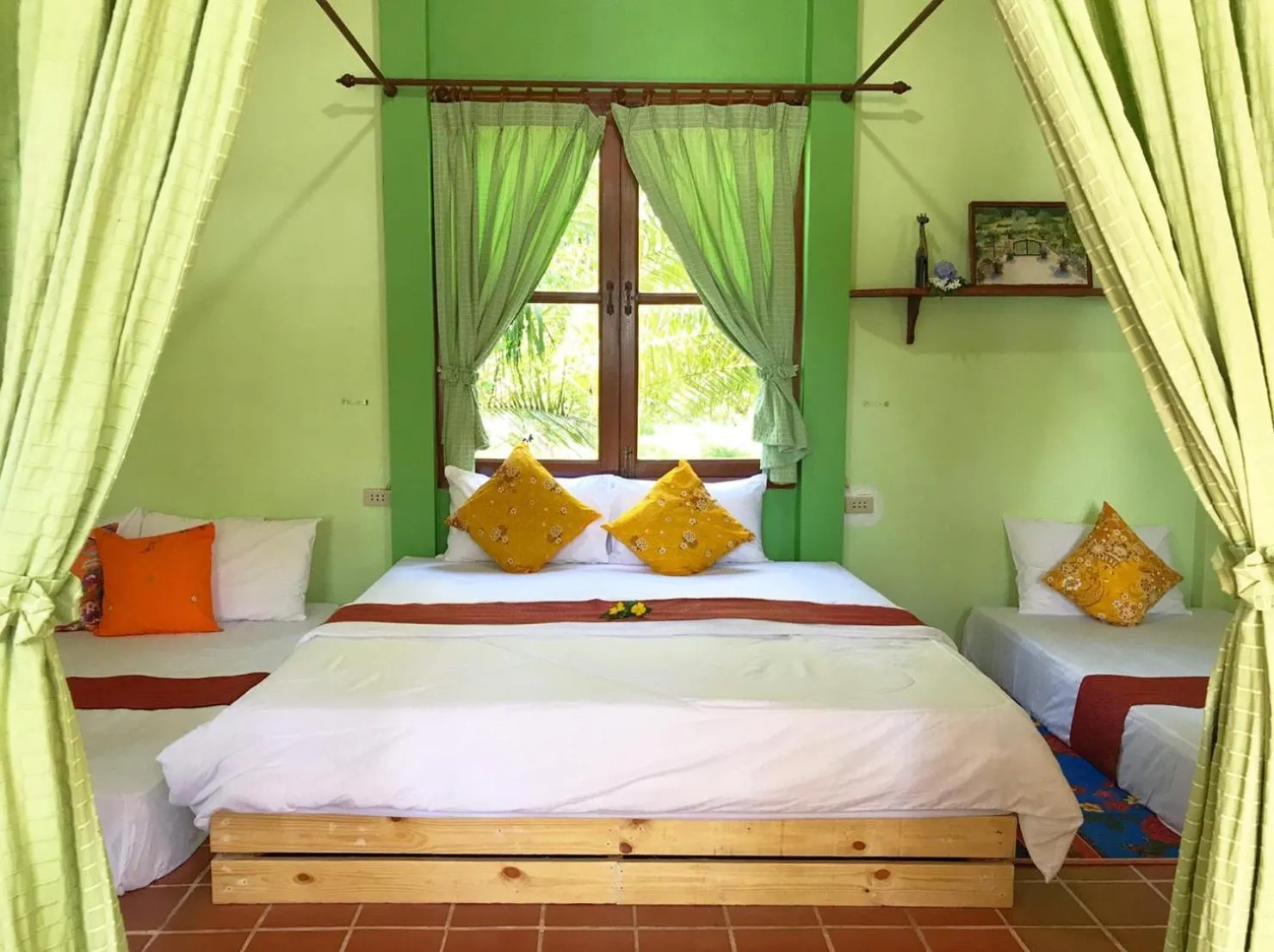 Bed in Ekman Garden Resort