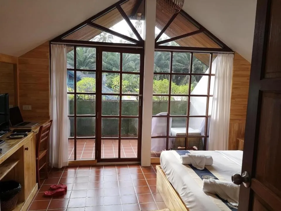 Bed in Ekman Garden Resort