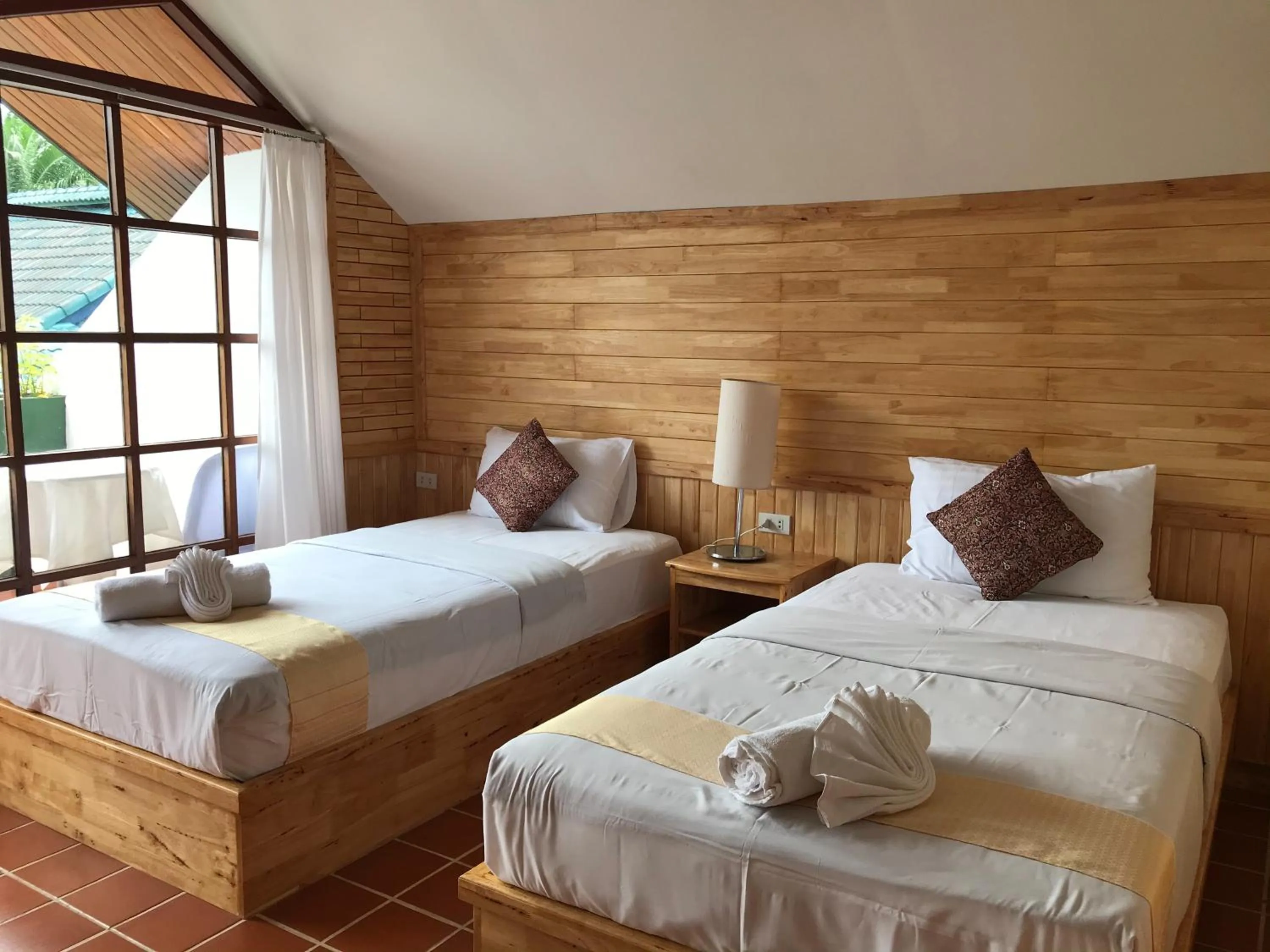 Bed in Ekman Garden Resort