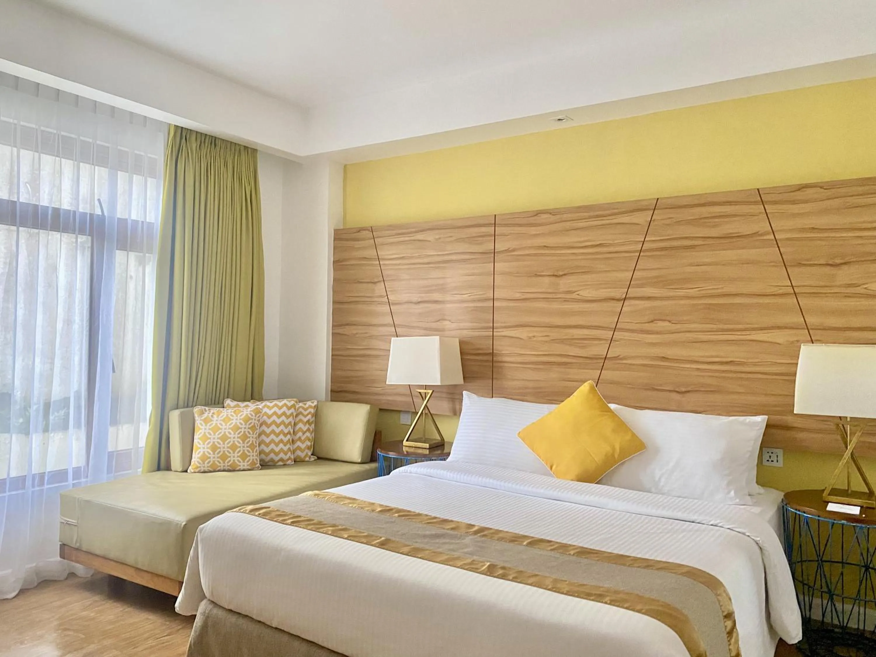 Bed in Ferra Hotel and Garden Suites