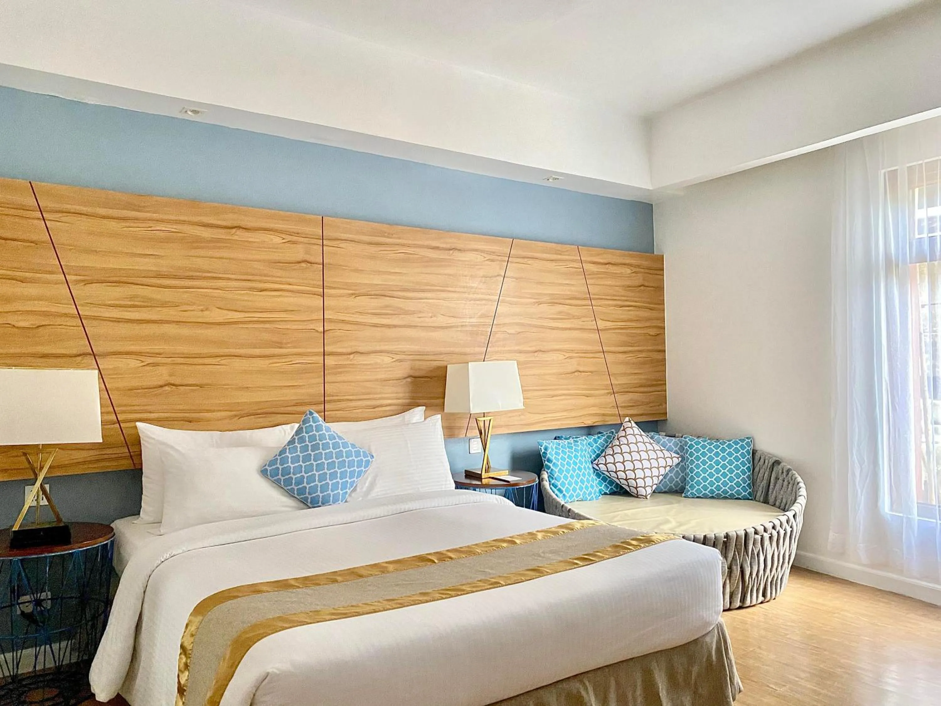 Bed in Ferra Hotel and Garden Suites